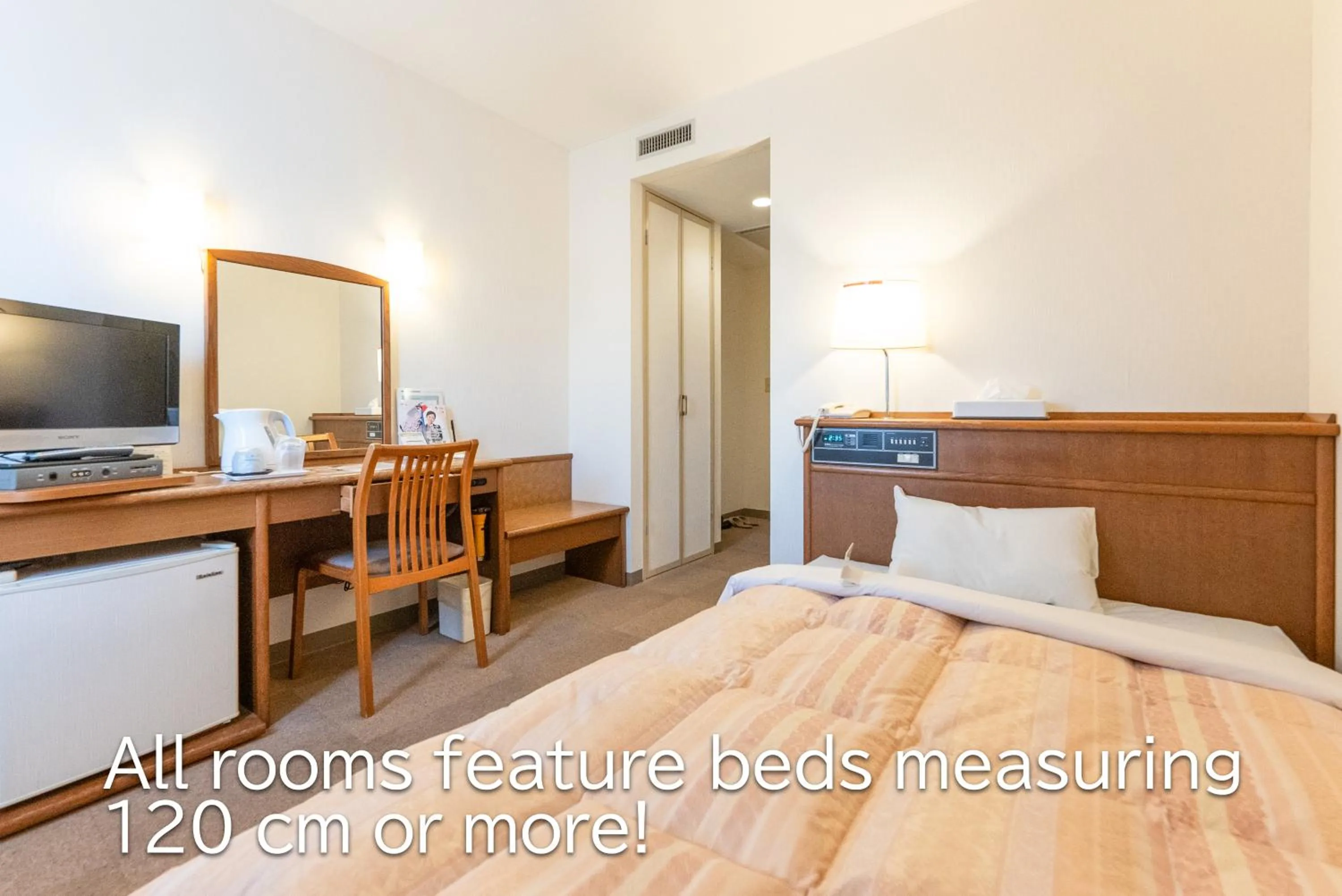 Bed in Tendo Central Hotel