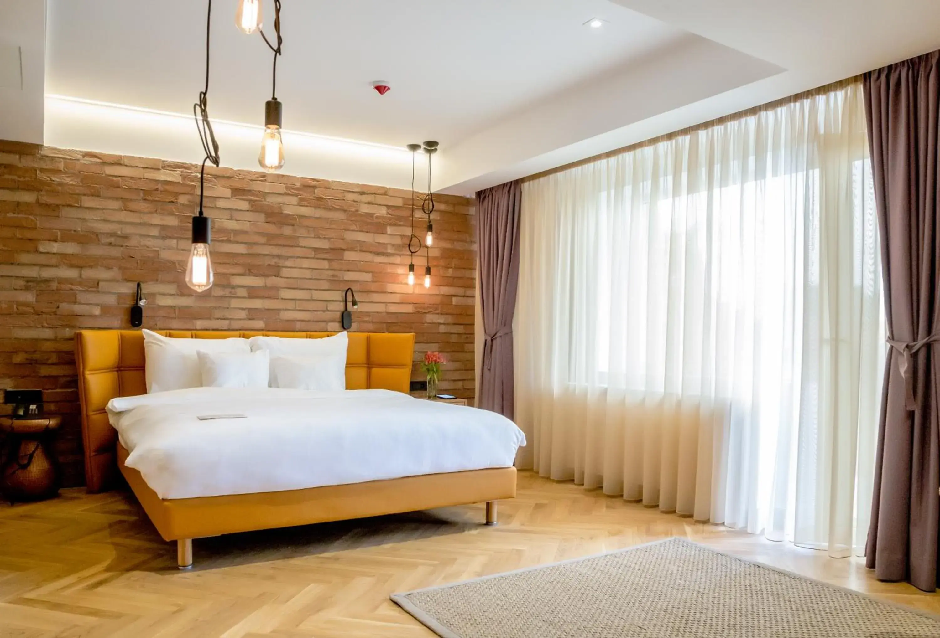 Bed in Caro Hotel Bed in Caro Hotel