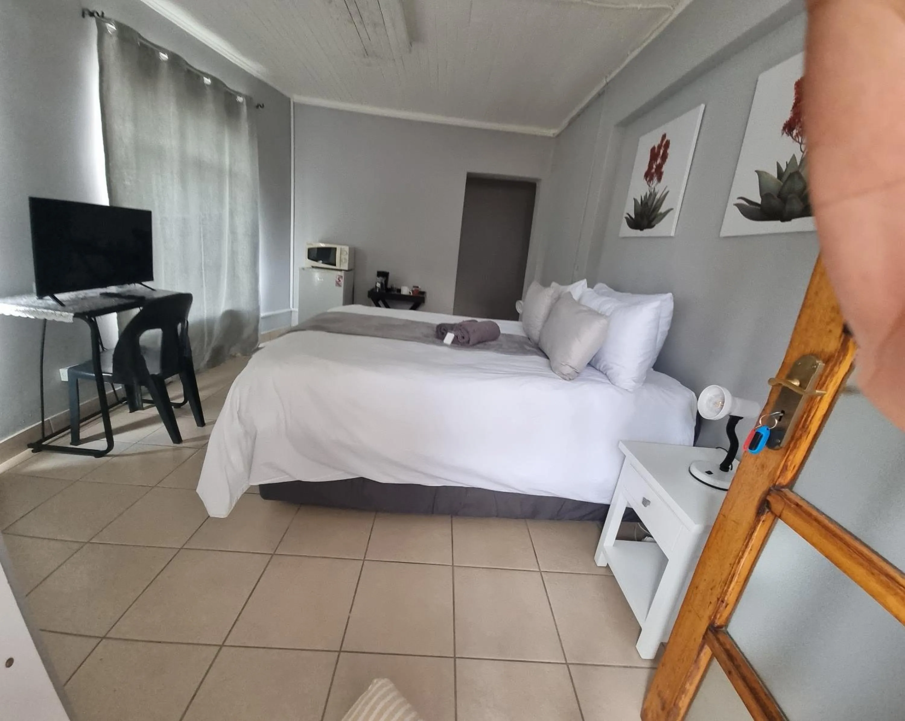 Bed in Stay at Home Airport Lodge