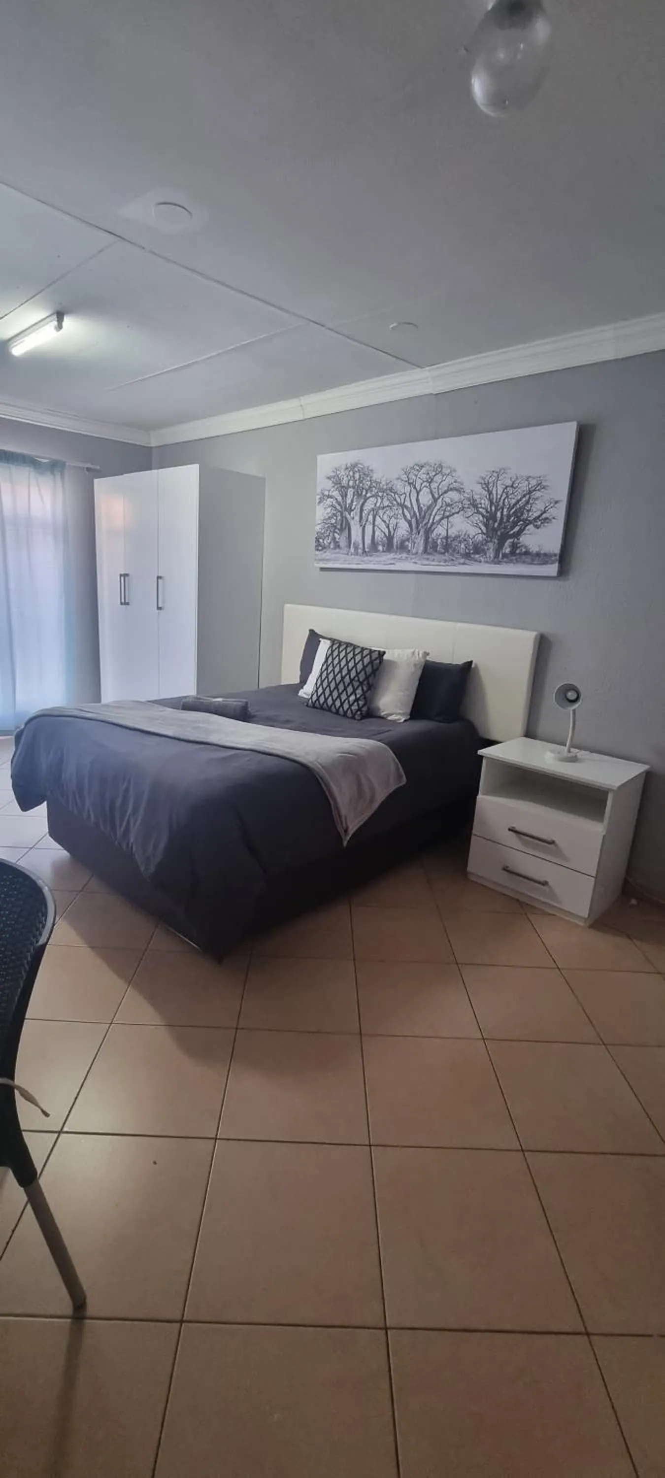 Bed in Stay at Home Airport Lodge