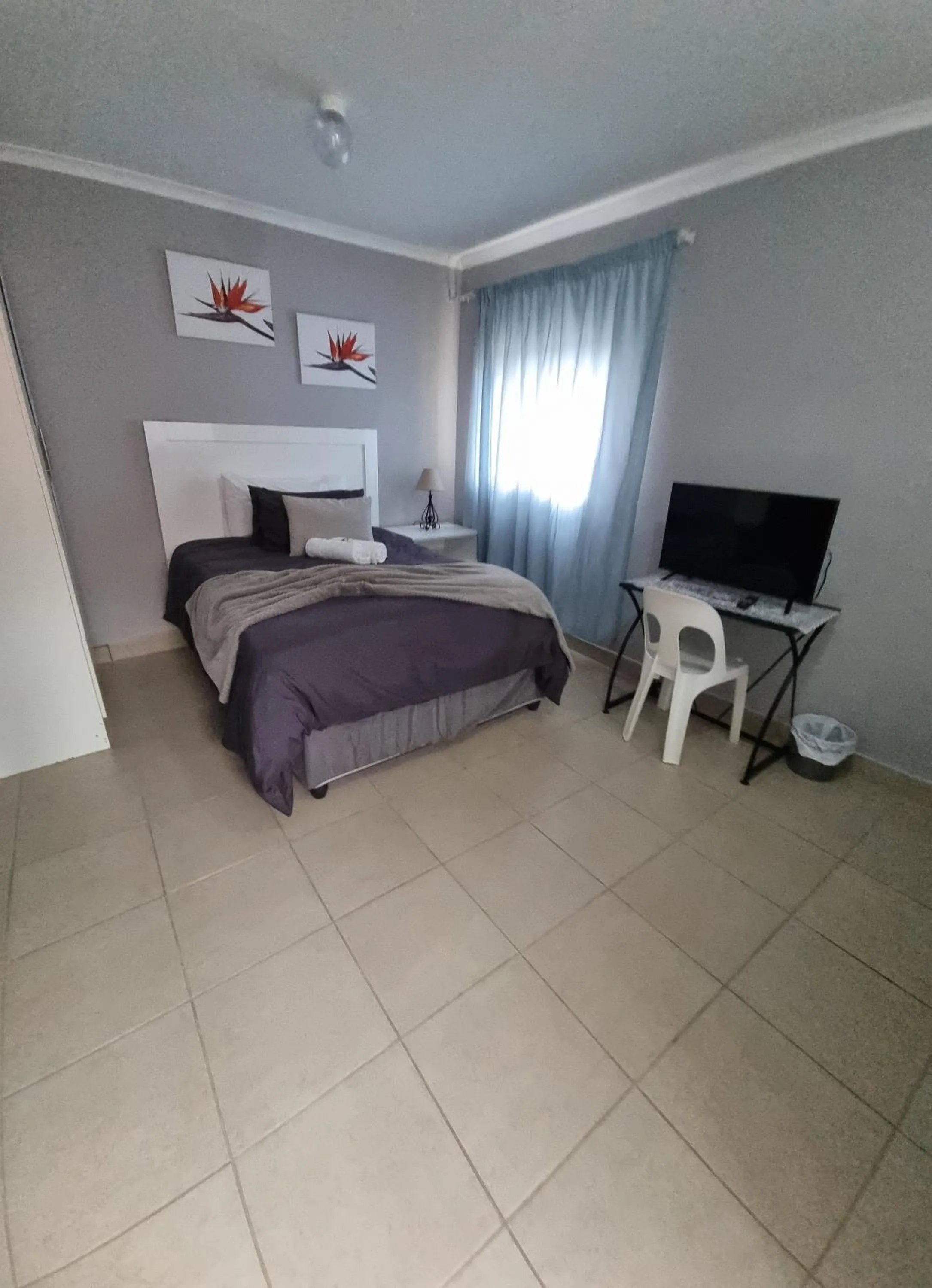 Bed in Stay at Home Airport Lodge