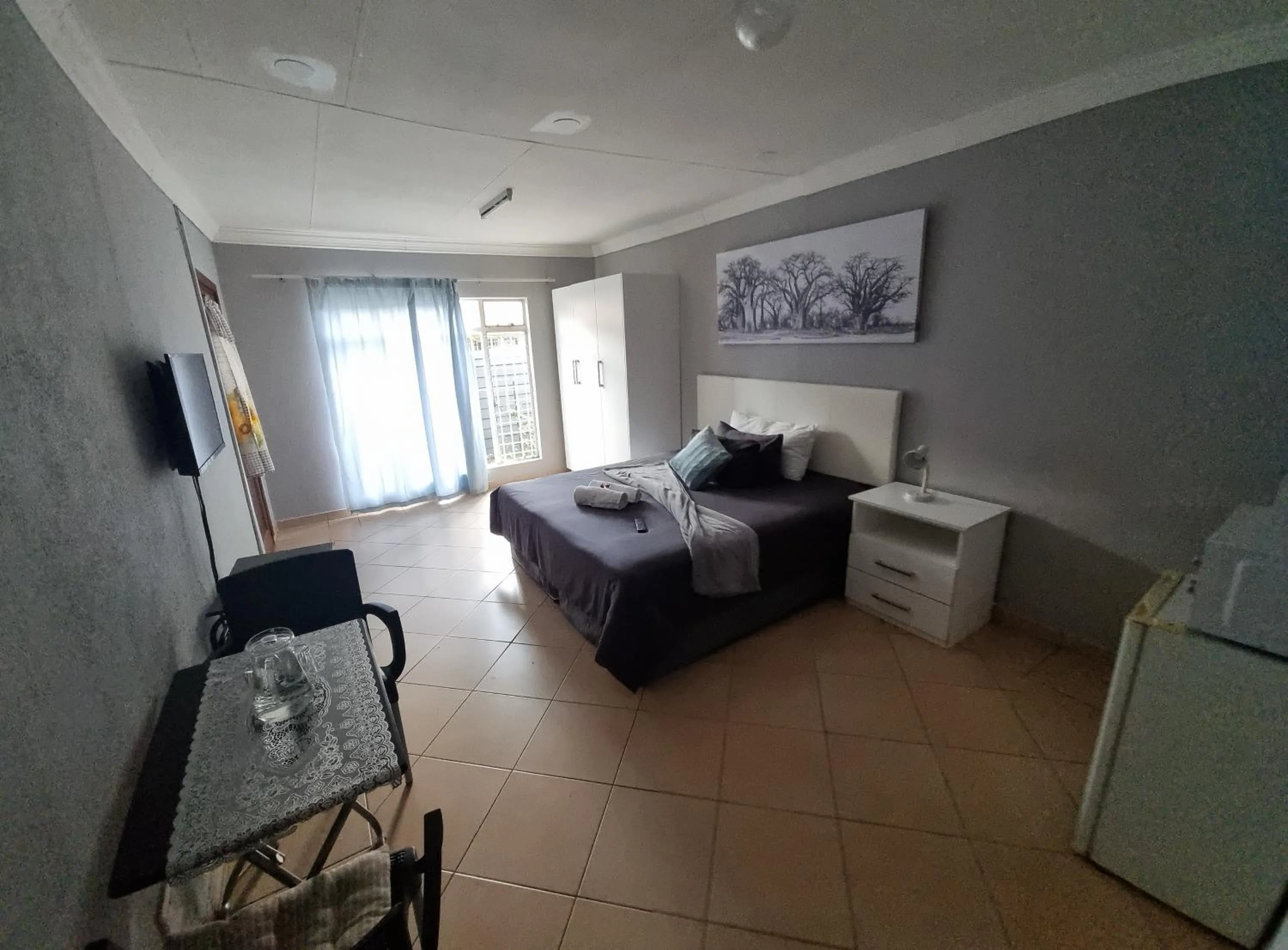 Bed in Stay at Home Airport Lodge