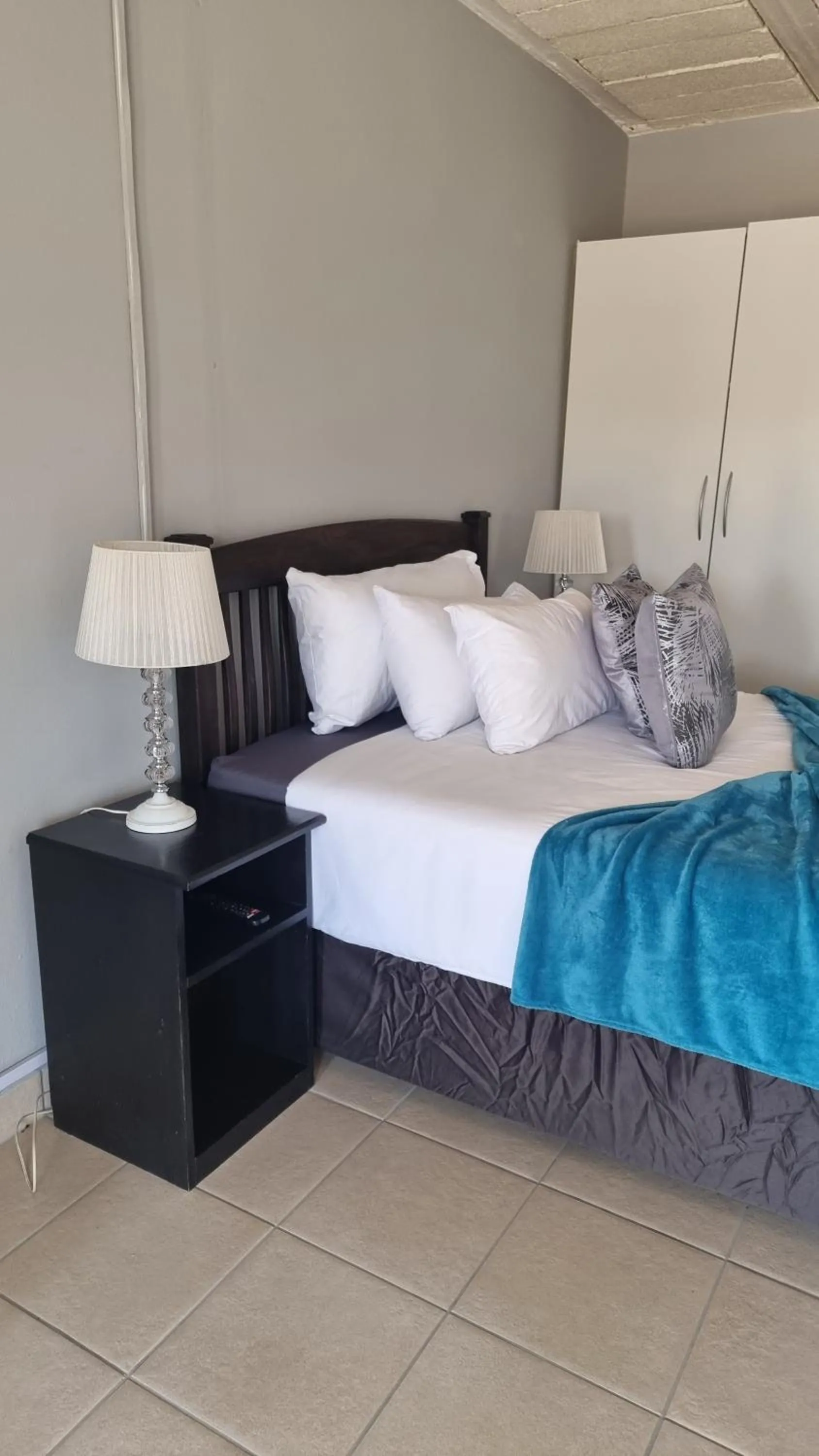 Bed in Stay at Home Airport Lodge