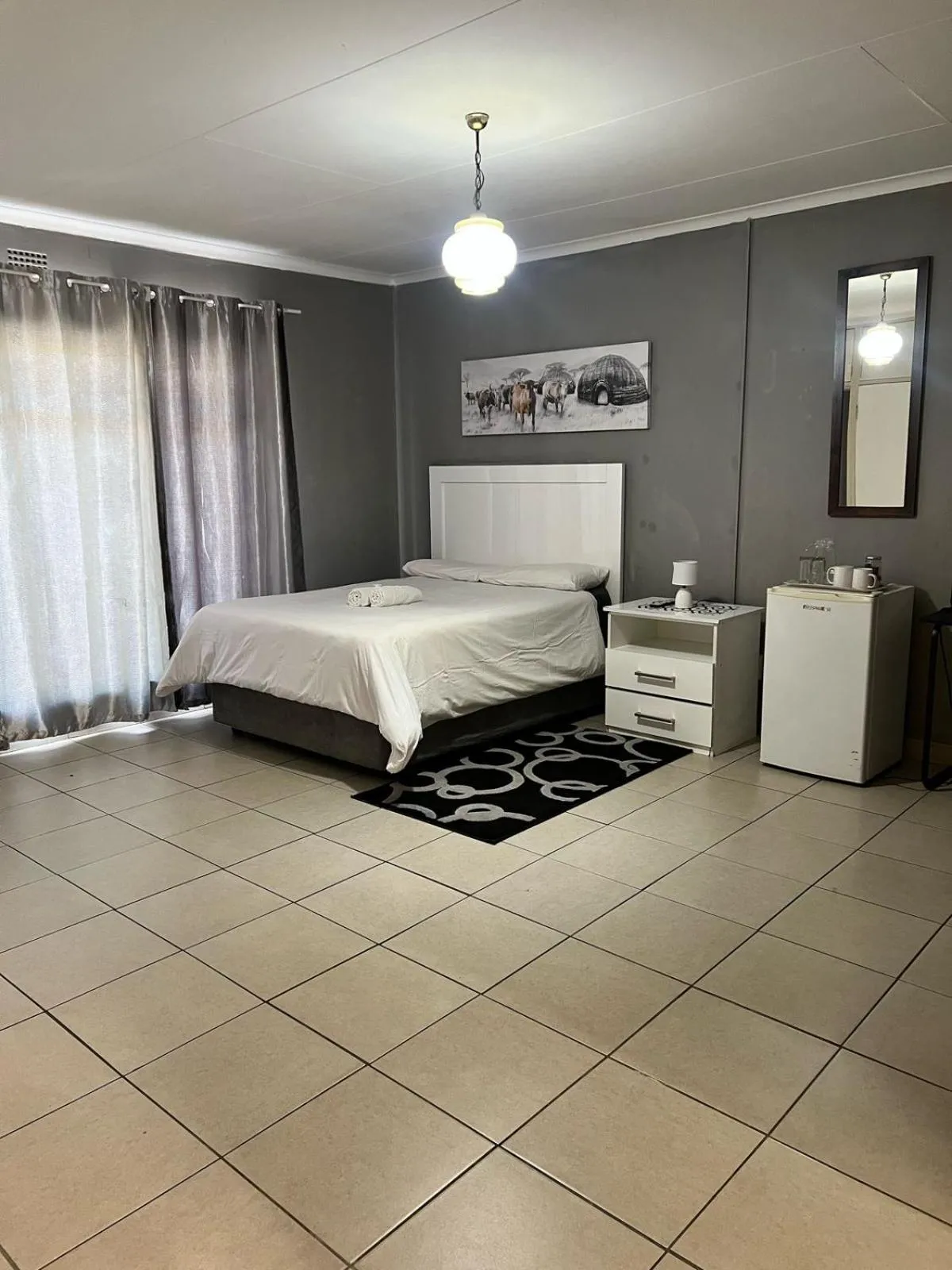 Bed in Stay at Home Airport Lodge