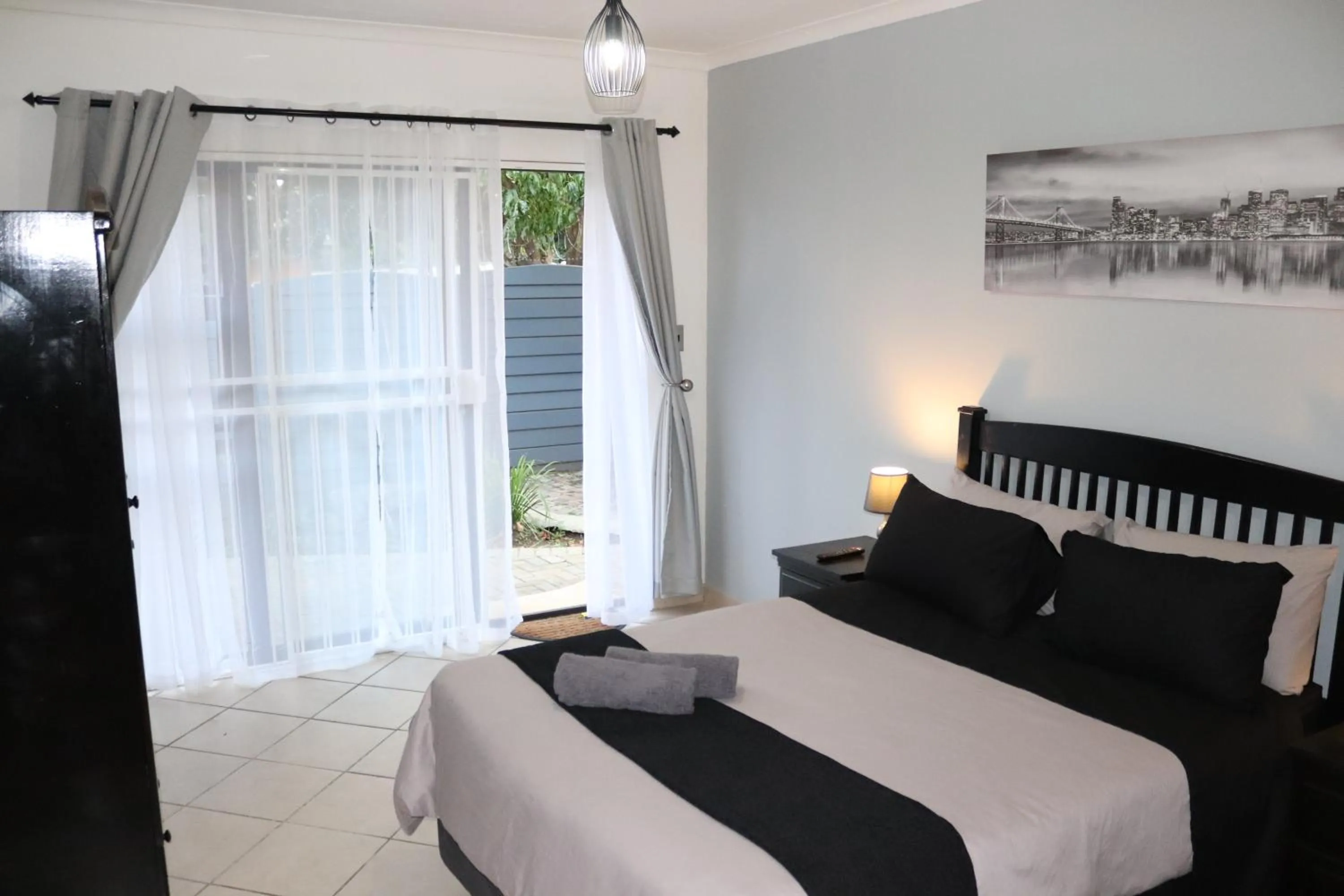 Bed in Stay at Home Airport Lodge