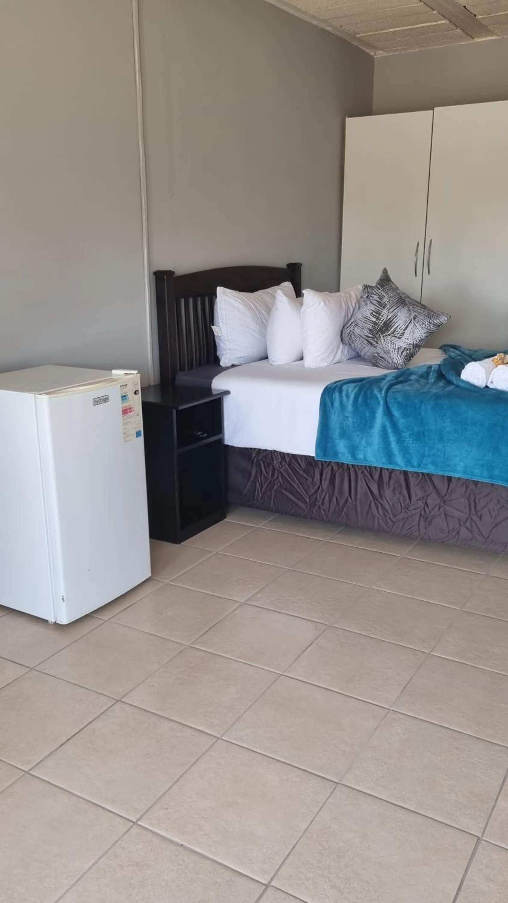 Bed in Stay at Home Airport Lodge