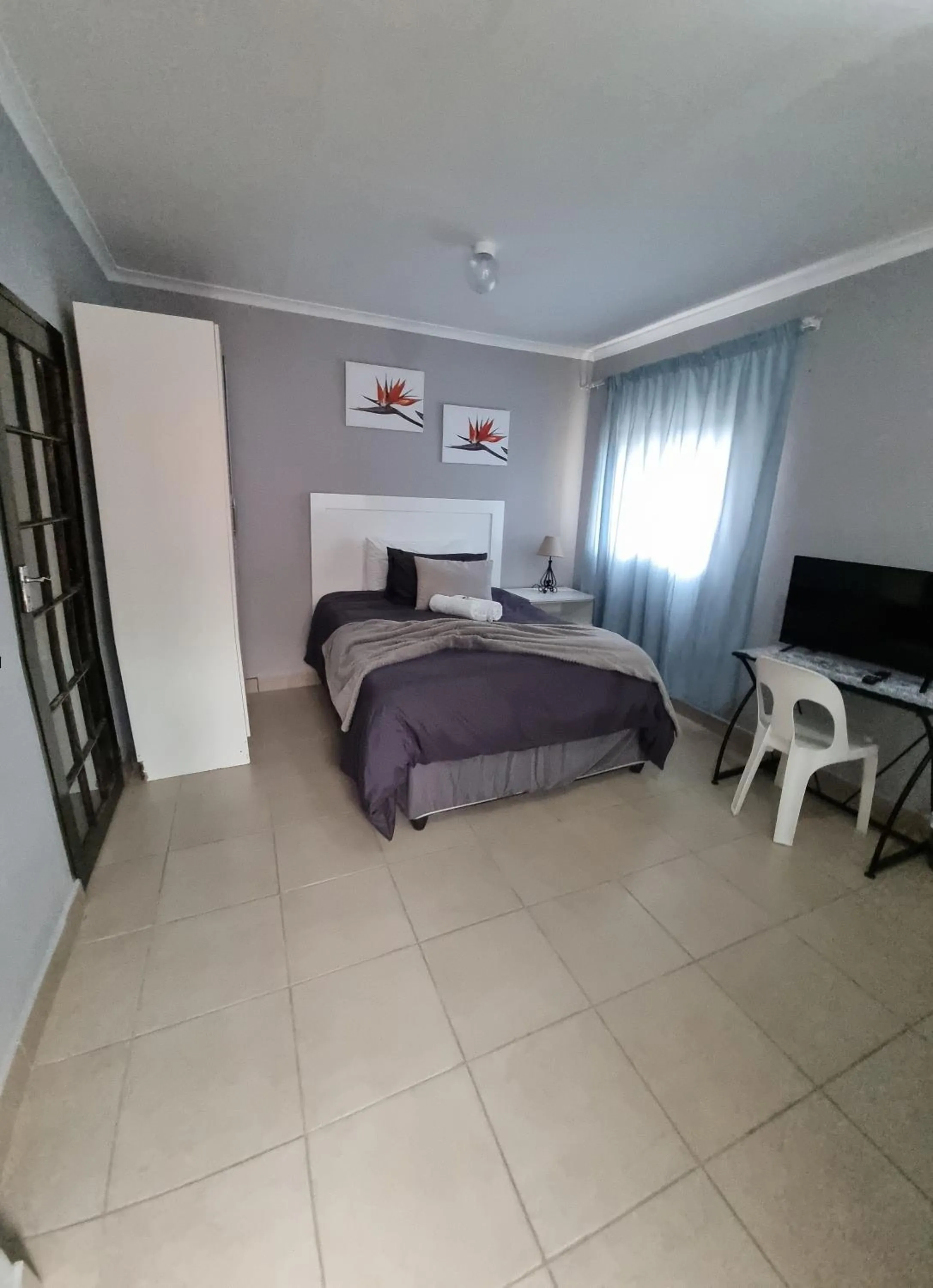 Bed in Stay at Home Airport Lodge