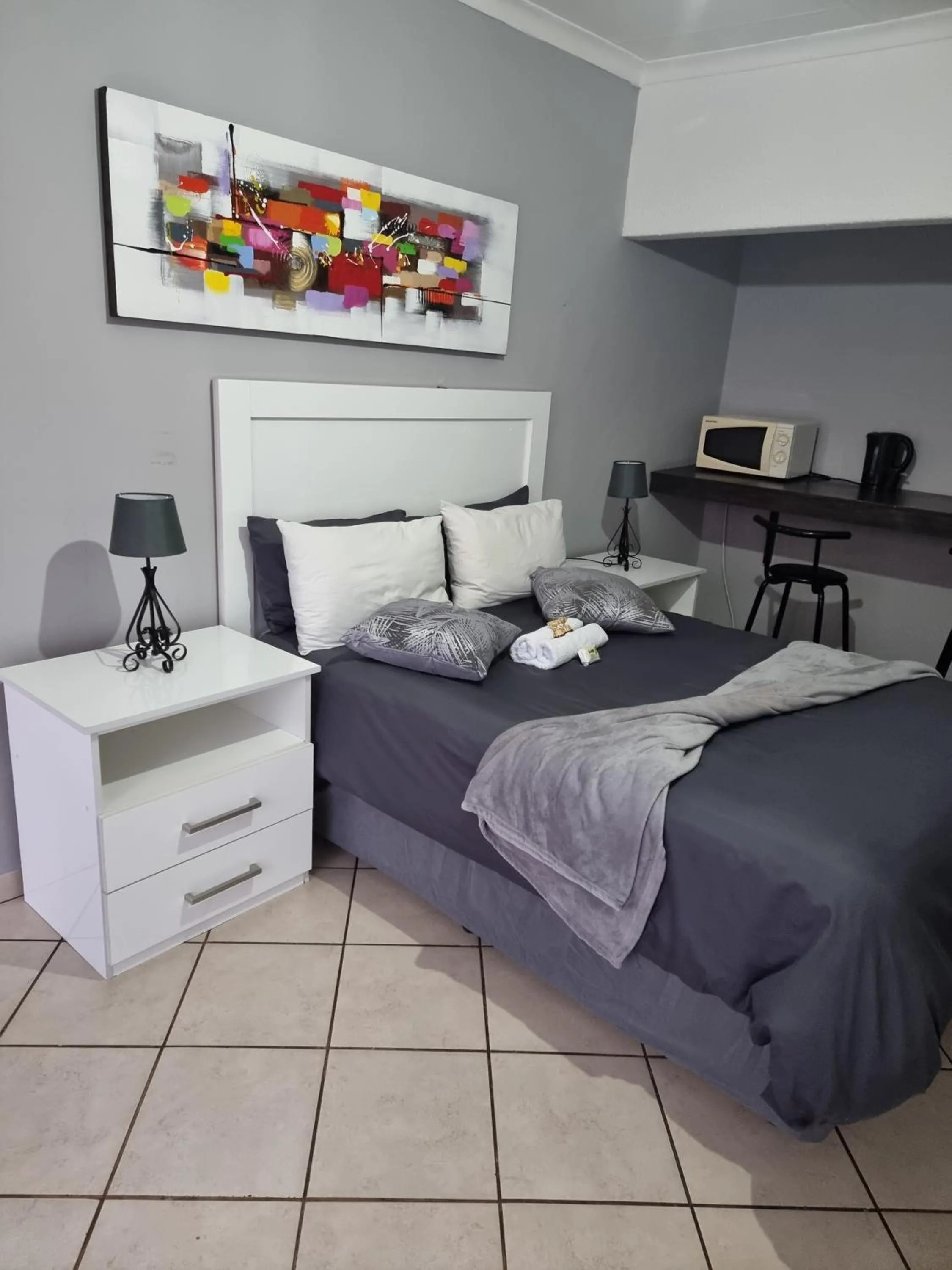 Bed in Stay at Home Airport Lodge