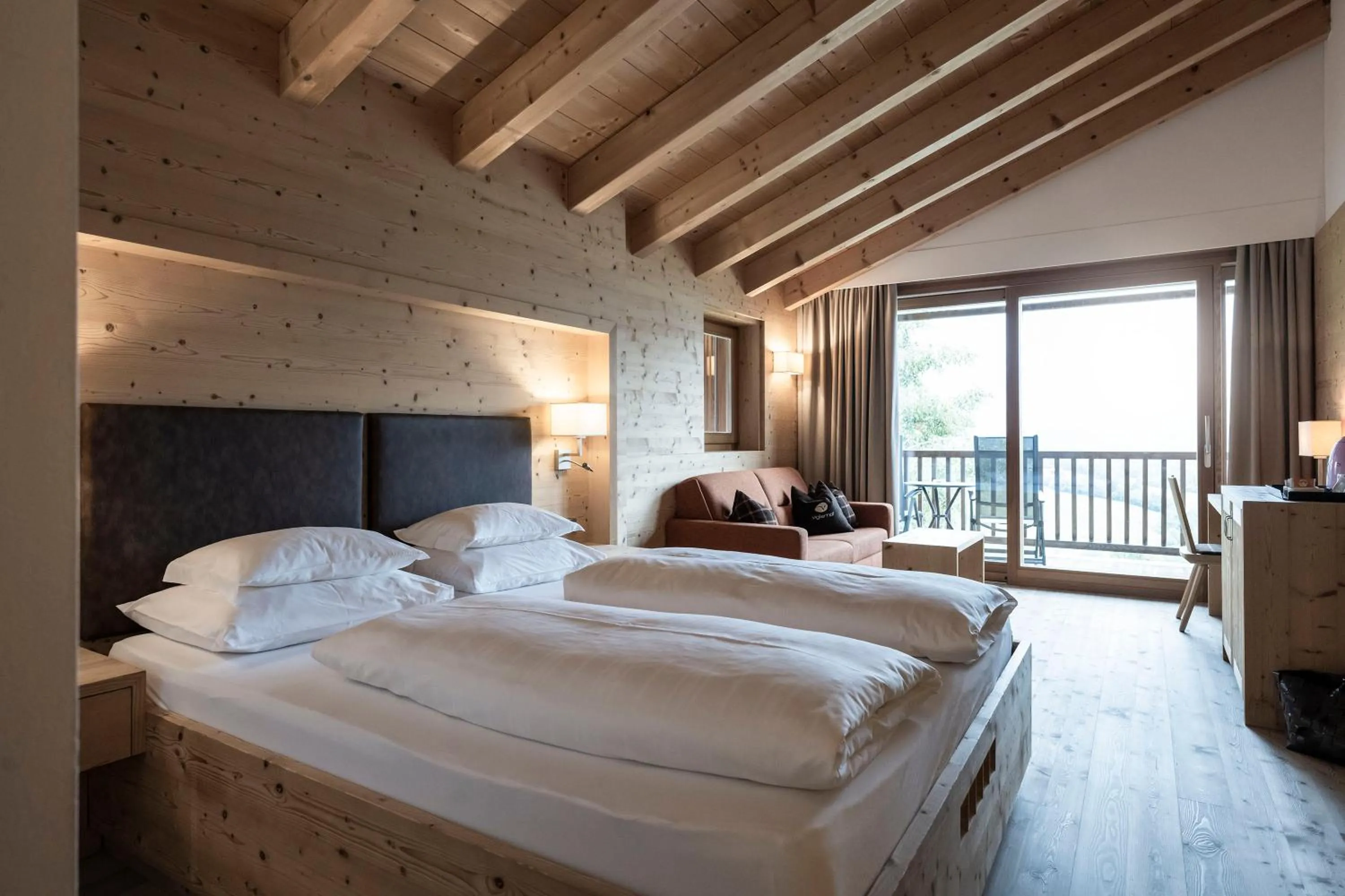 Photo of the whole room, Bed in Dolomites Nature Hotel Vigilerhof