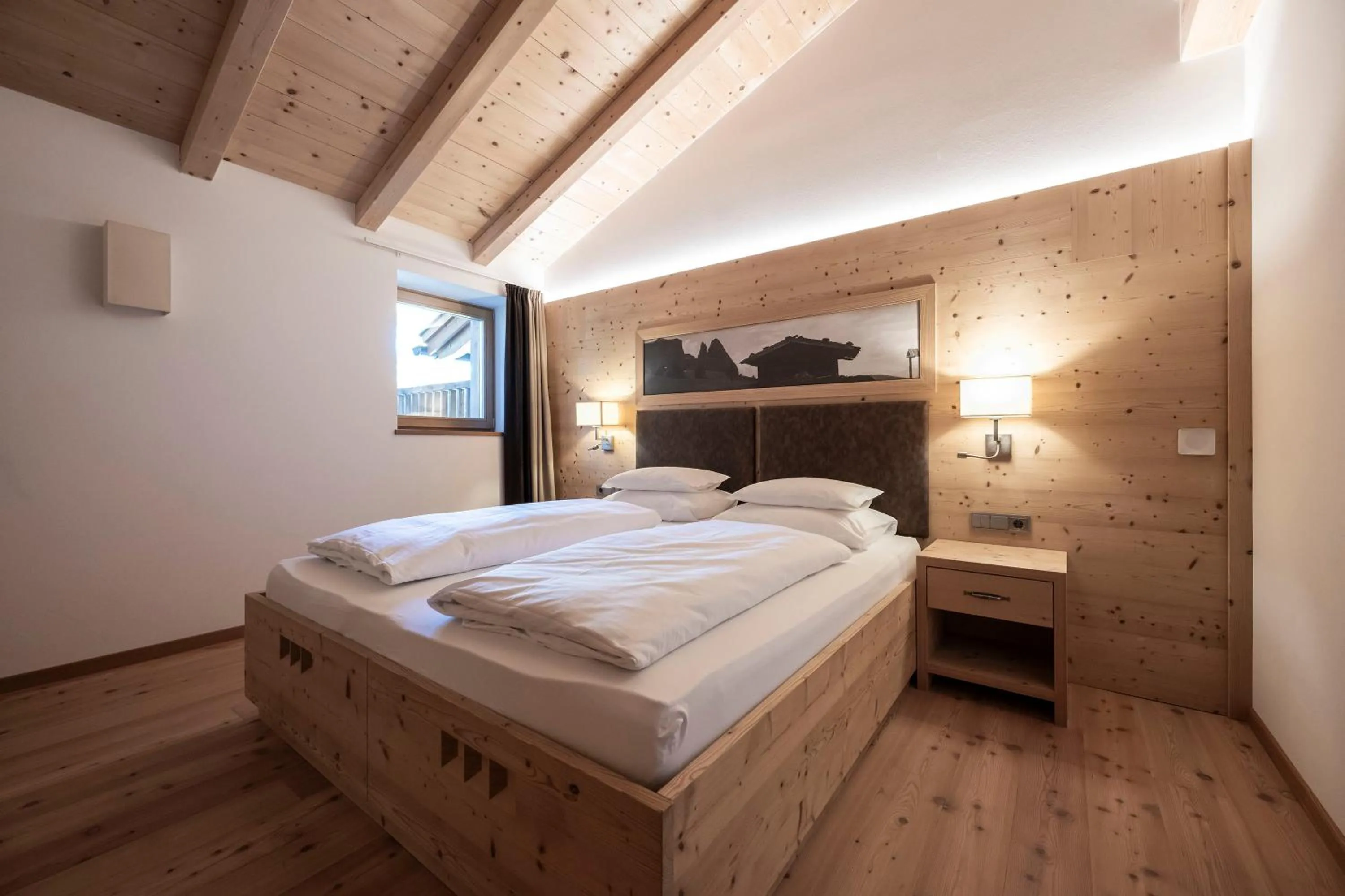 Photo of the whole room, Bed in Dolomites Nature Hotel Vigilerhof