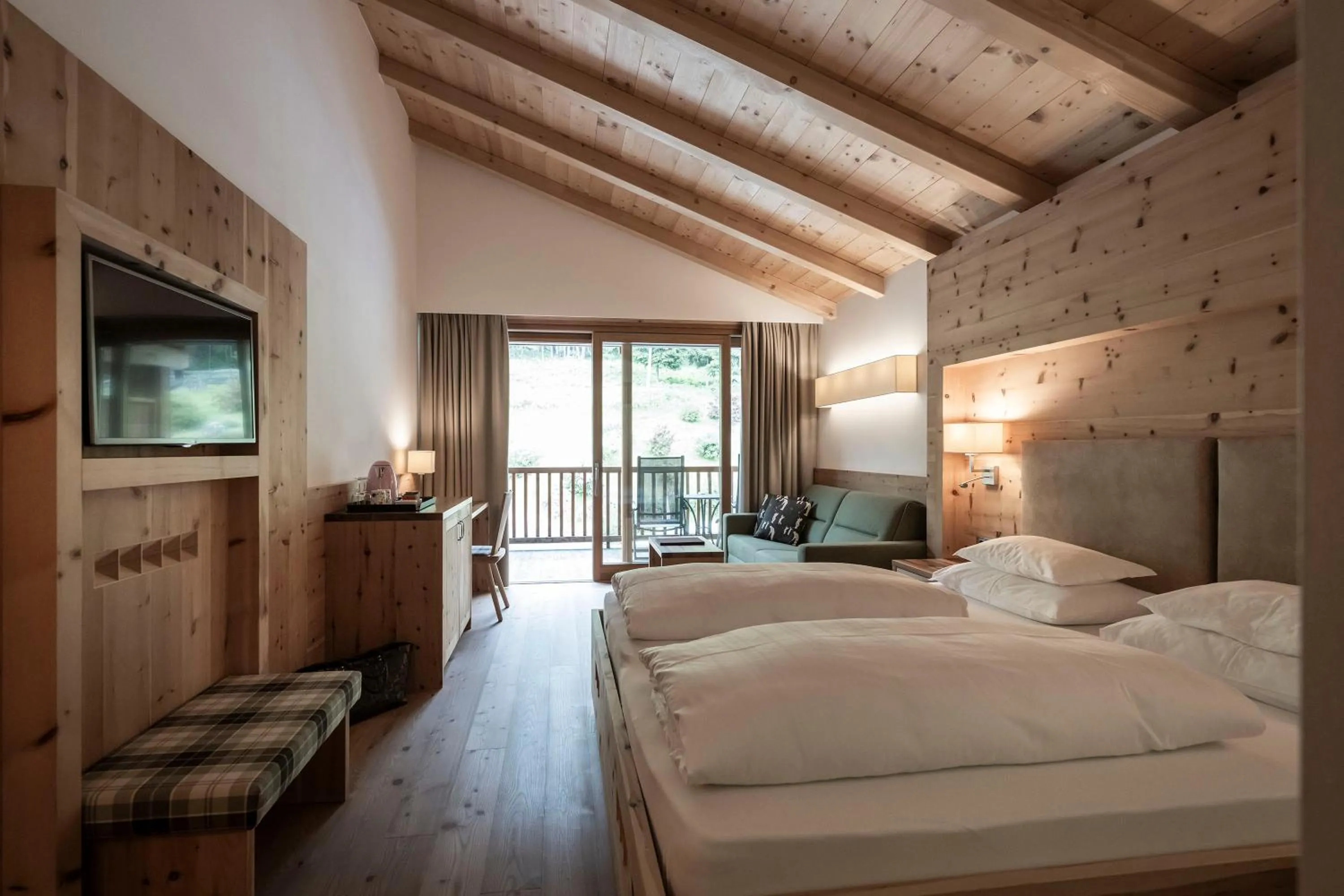 Photo of the whole room, Bed in Dolomites Nature Hotel Vigilerhof