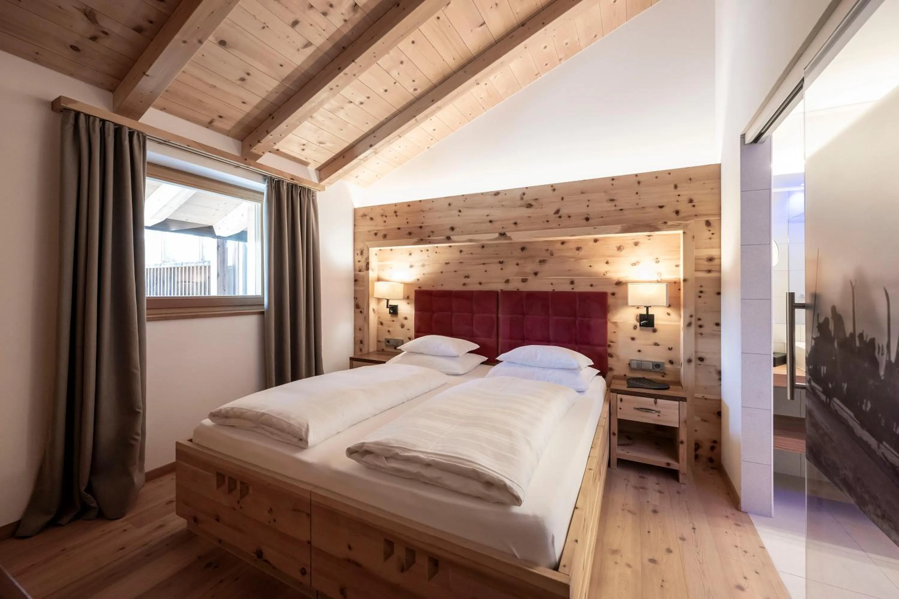 Photo of the whole room, Bed in Dolomites Nature Hotel Vigilerhof