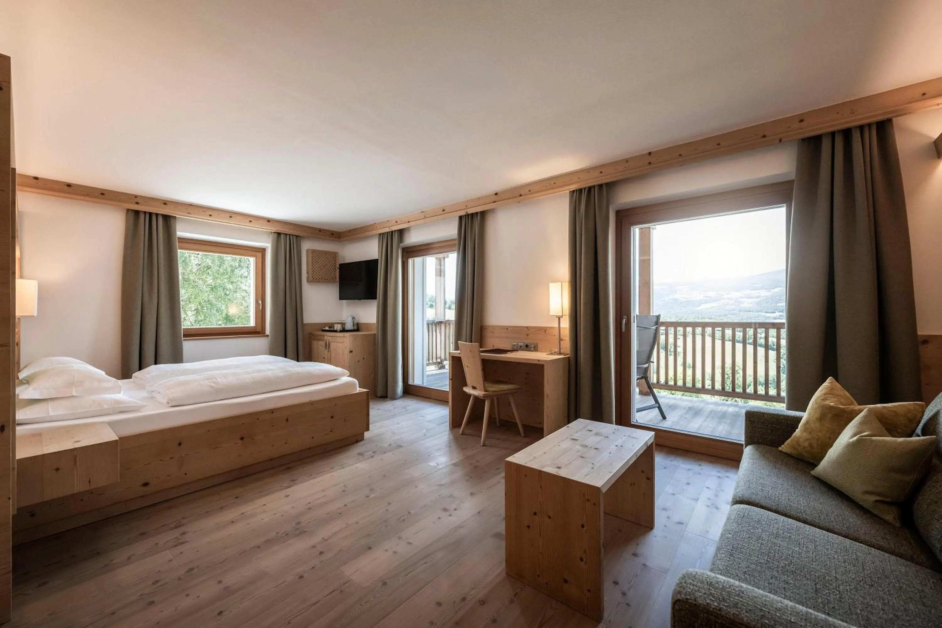 Photo of the whole room, Bed in Dolomites Nature Hotel Vigilerhof
