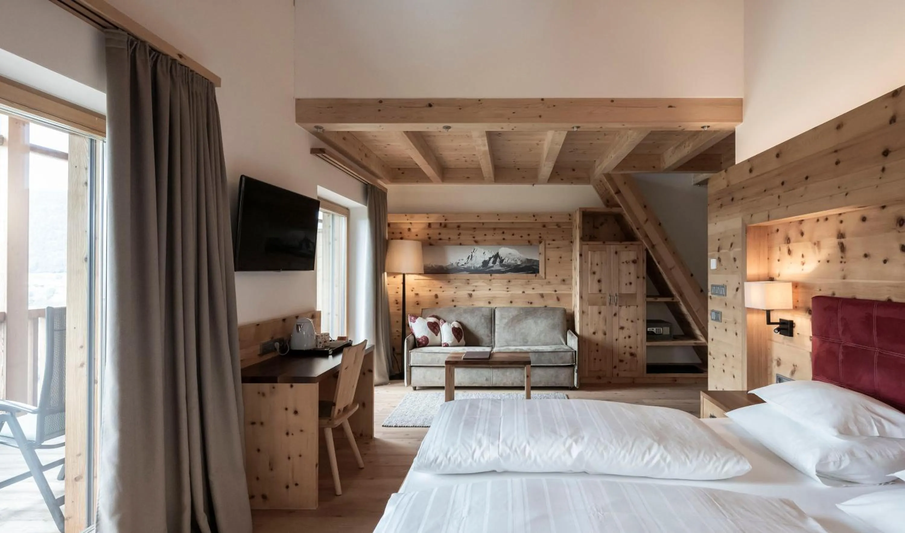 Photo of the whole room, Bed in Dolomites Nature Hotel Vigilerhof