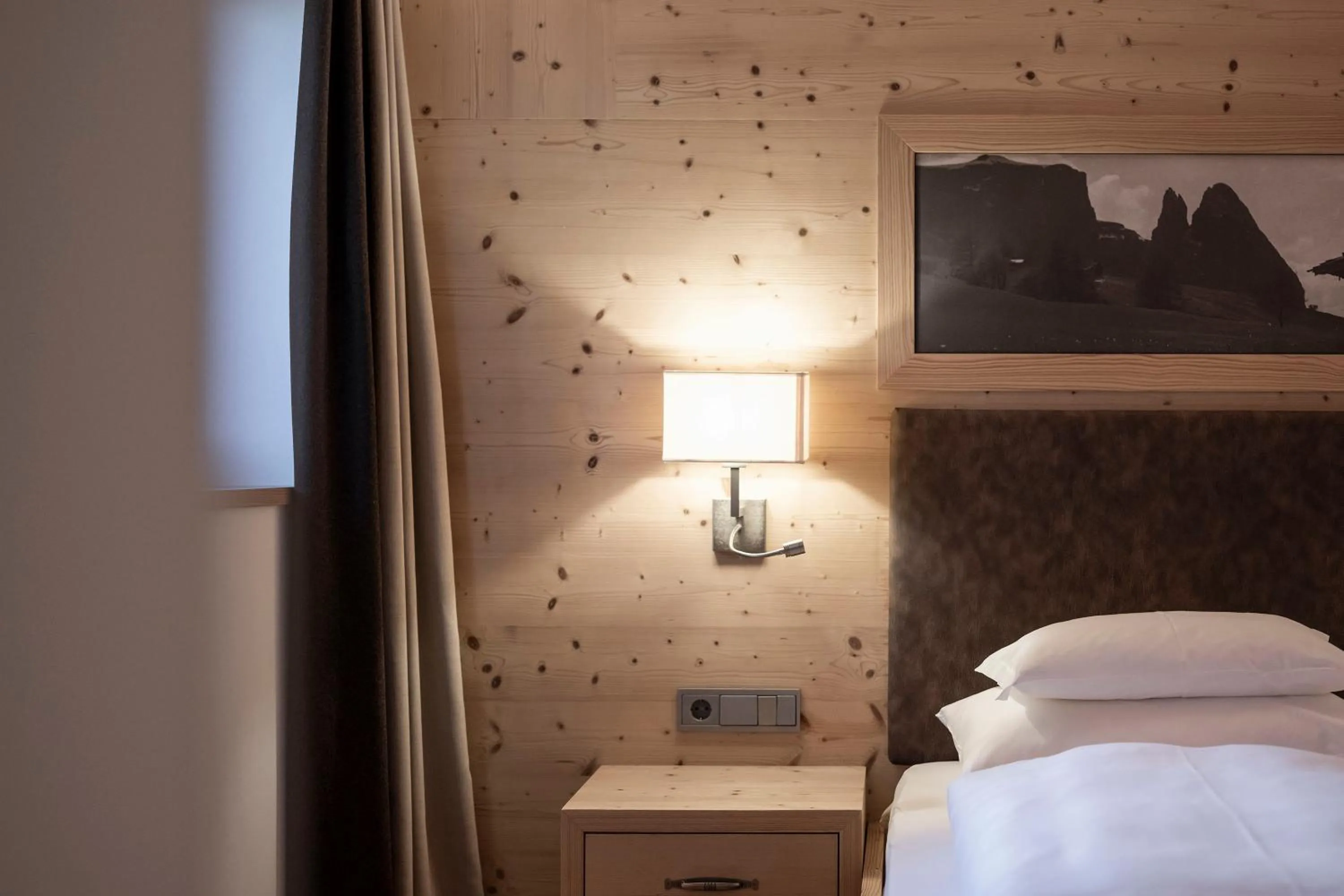 Photo of the whole room, Bed in Dolomites Nature Hotel Vigilerhof