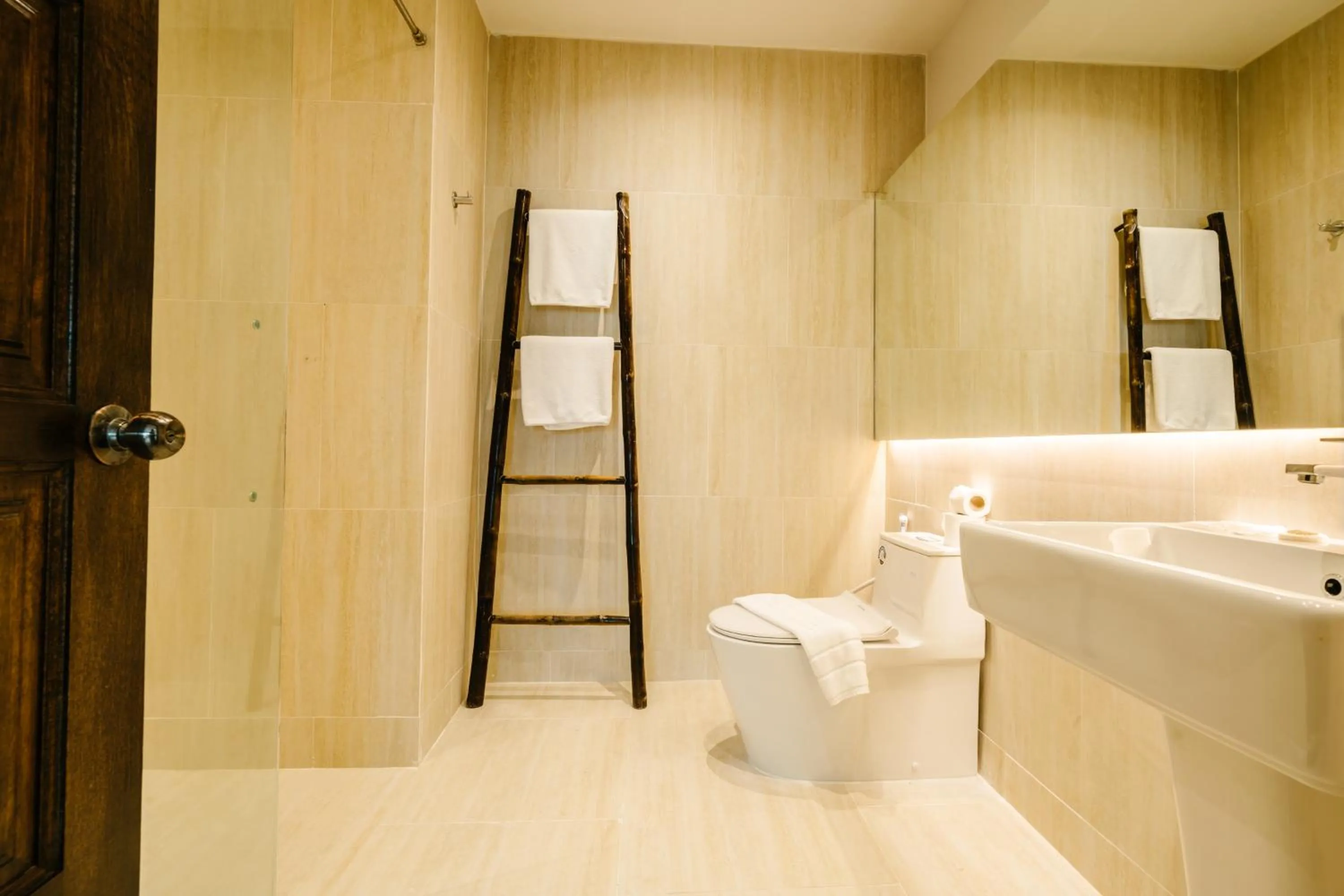 Toilet in The Opium Chiang Mai