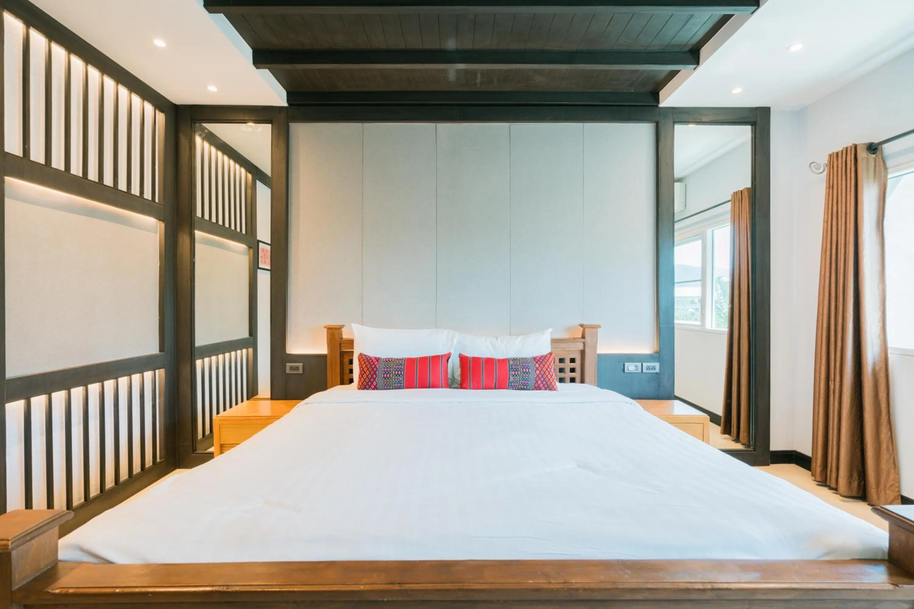 Bed in The Opium Chiang Mai