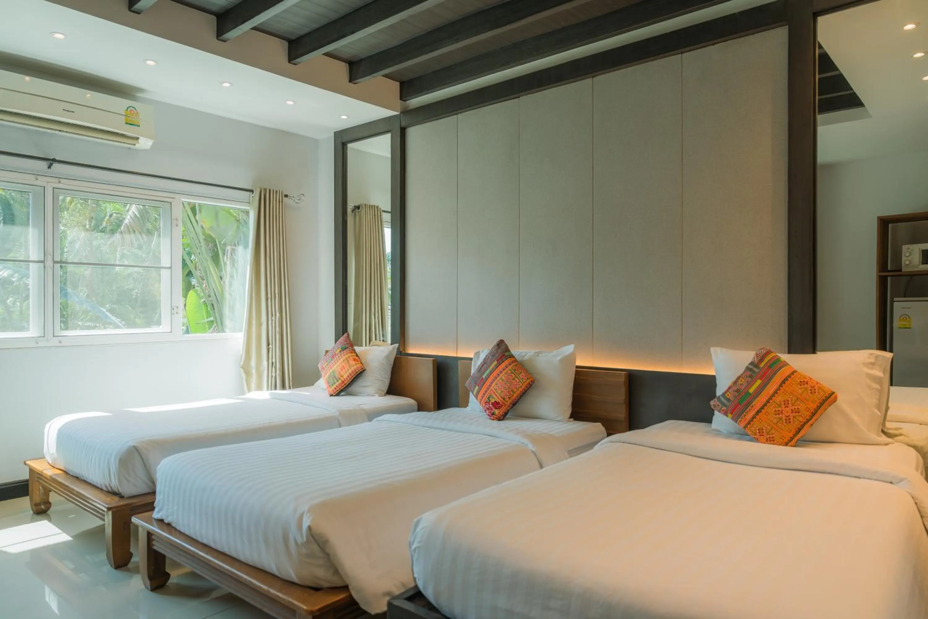 Bed in The Opium Chiang Mai