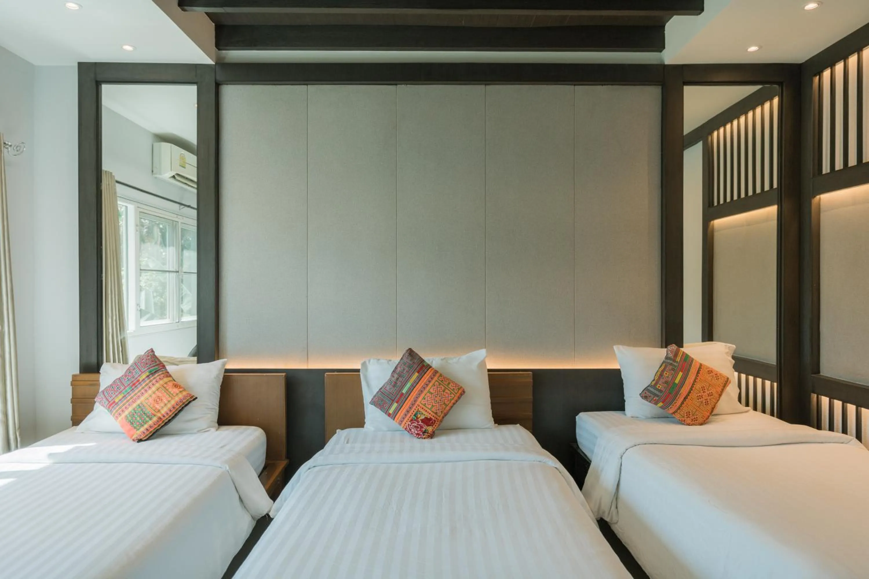 Photo of the whole room, Bed in The Opium Chiang Mai