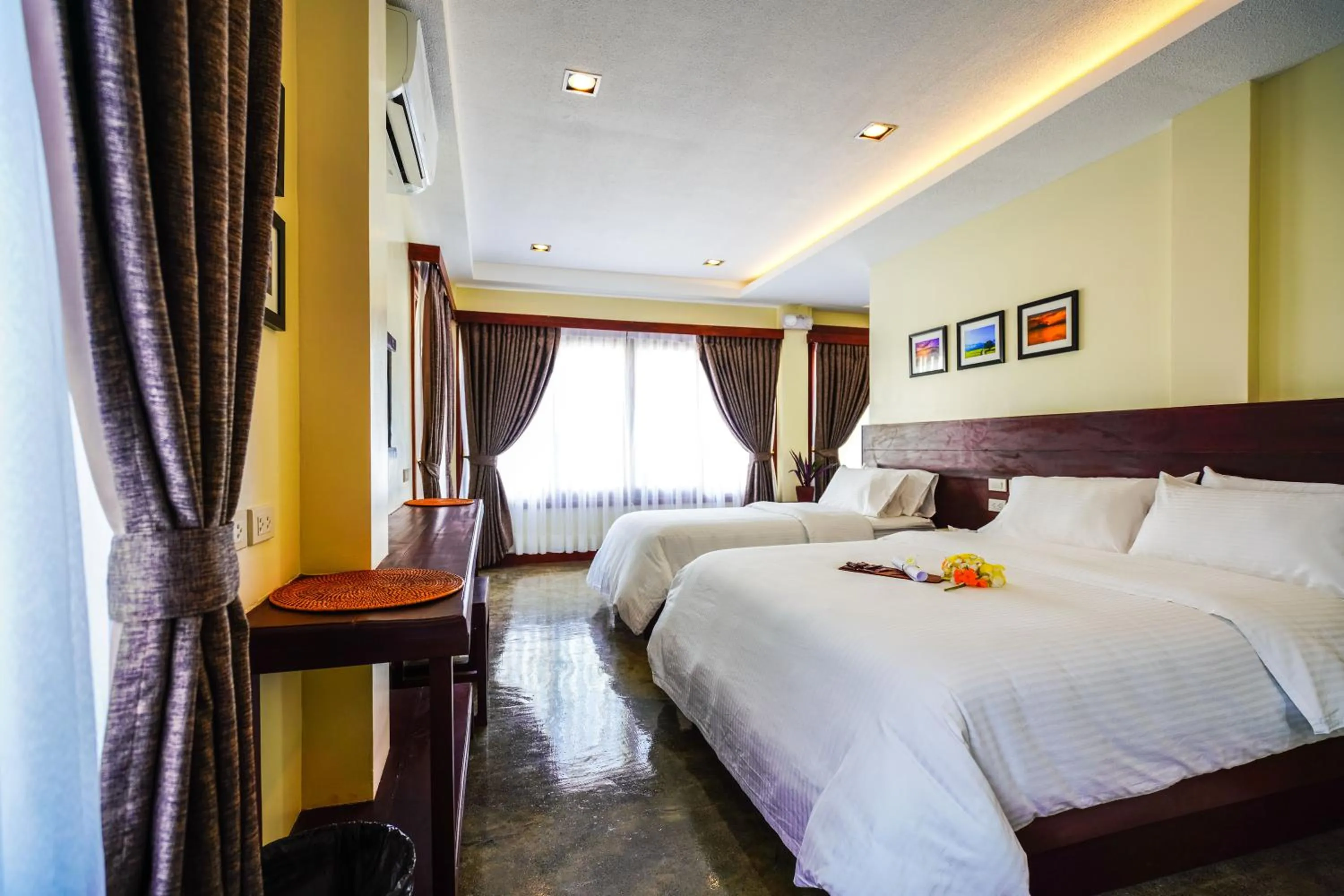 Photo of the whole room, Bed in Retreat Siargao Resort