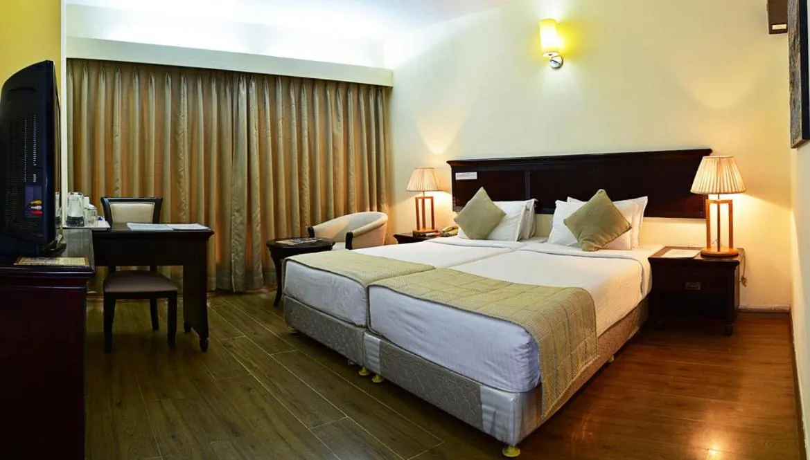 Bed in Inventree hotels & Resort