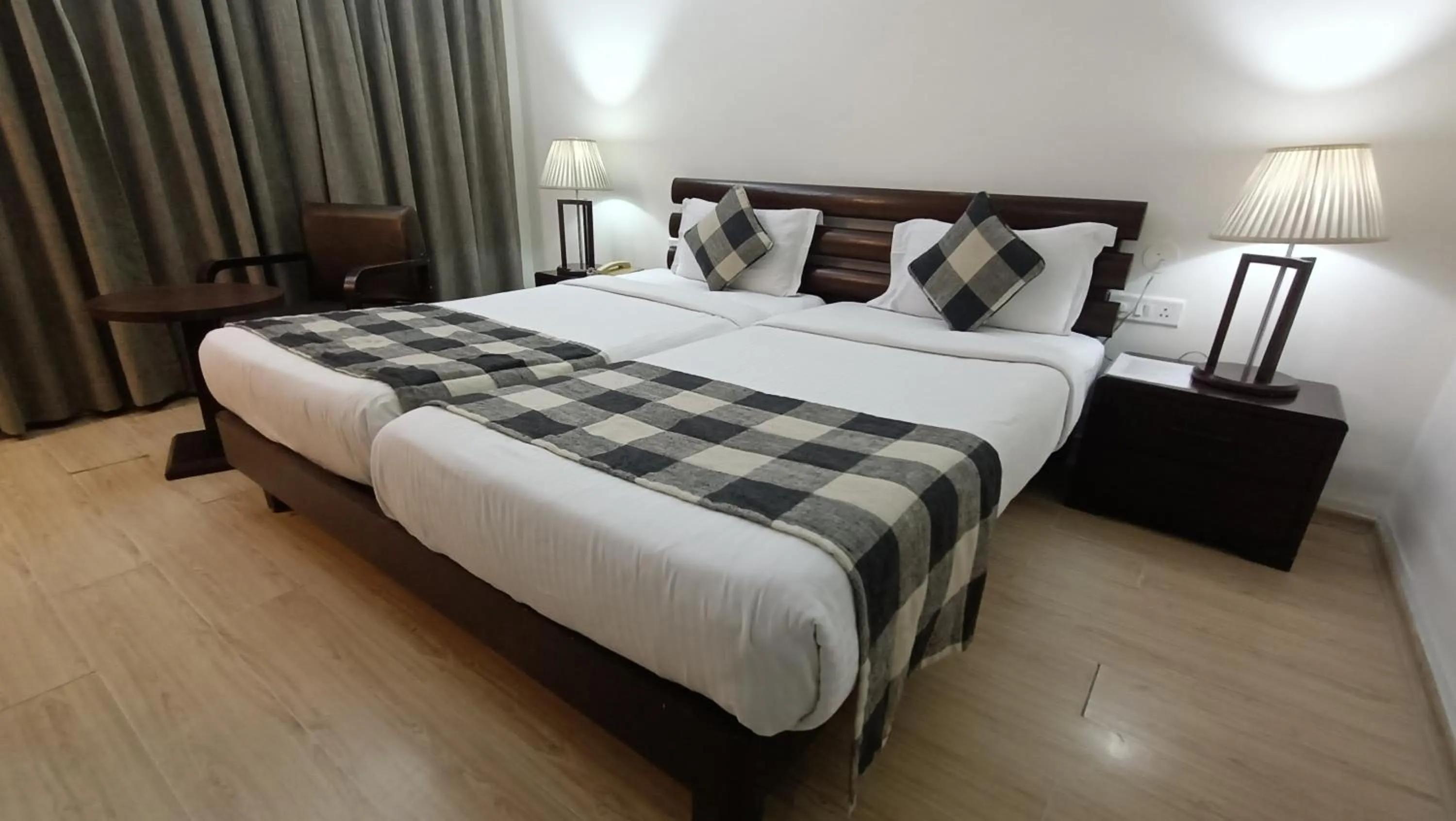 Bed in Inventree hotels & Resort