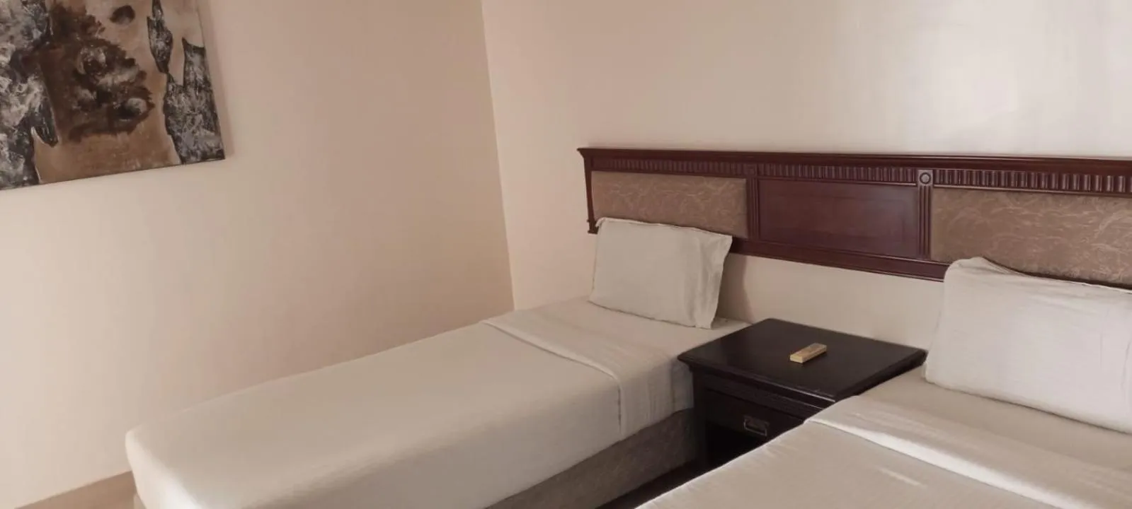 Bed in Inventree hotels & Resort