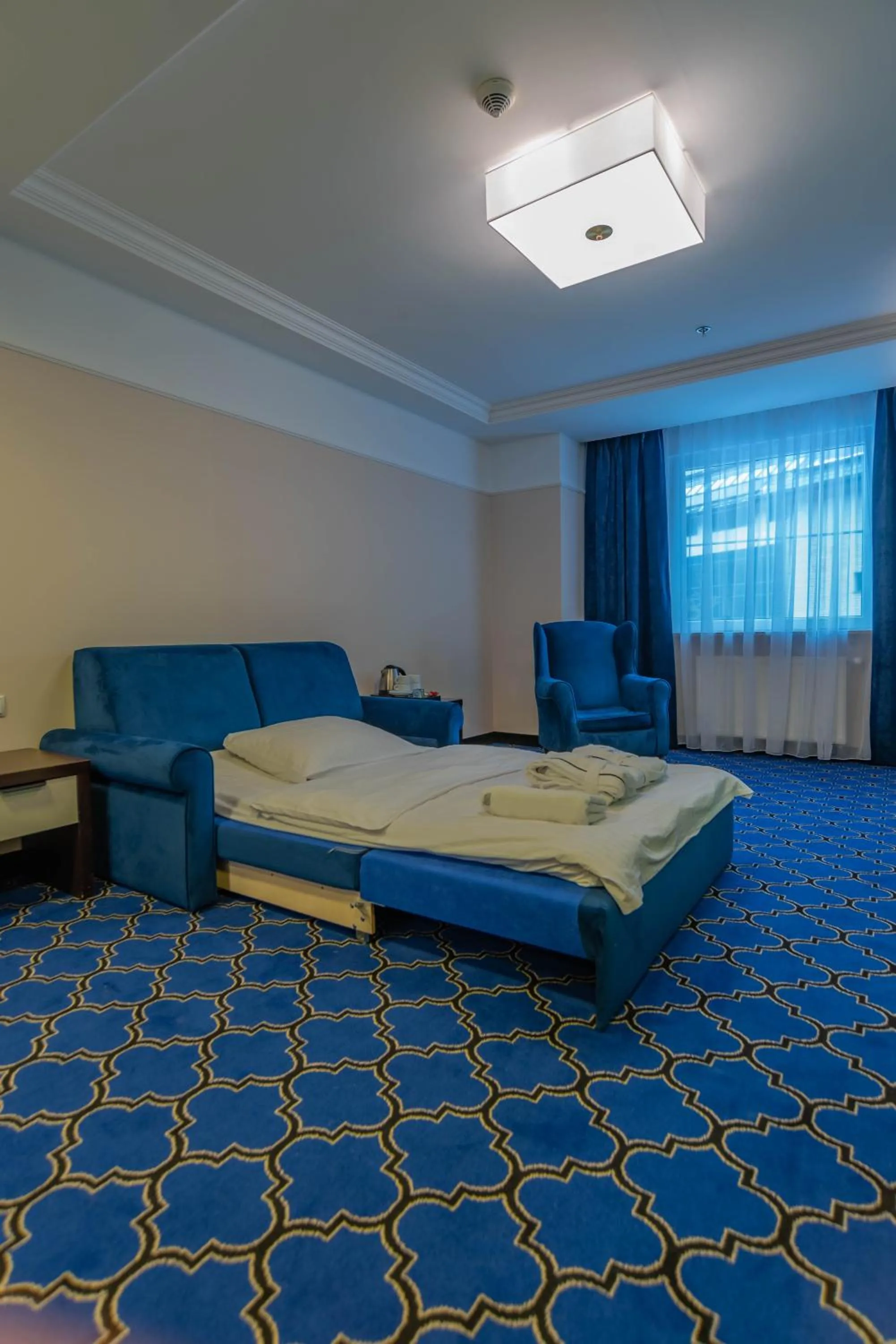Living room, Bed in Hotel Czarny Potok Resort SPA & Conference