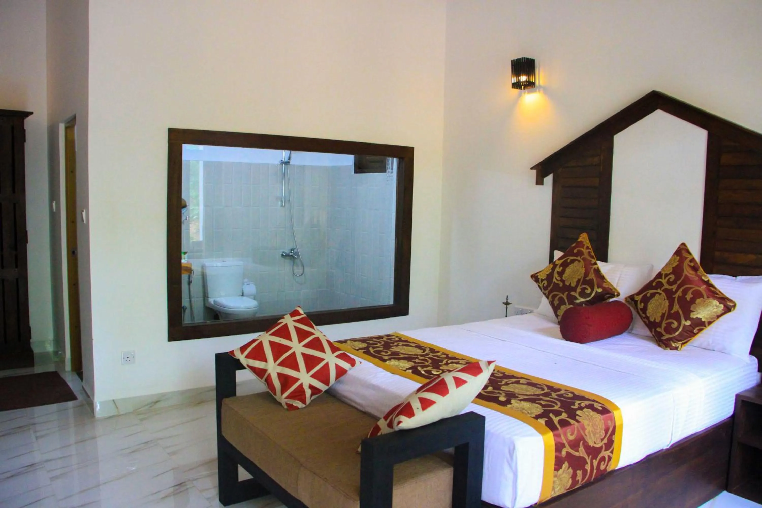 Bed in Palmyra Nature Resort Sigiriya