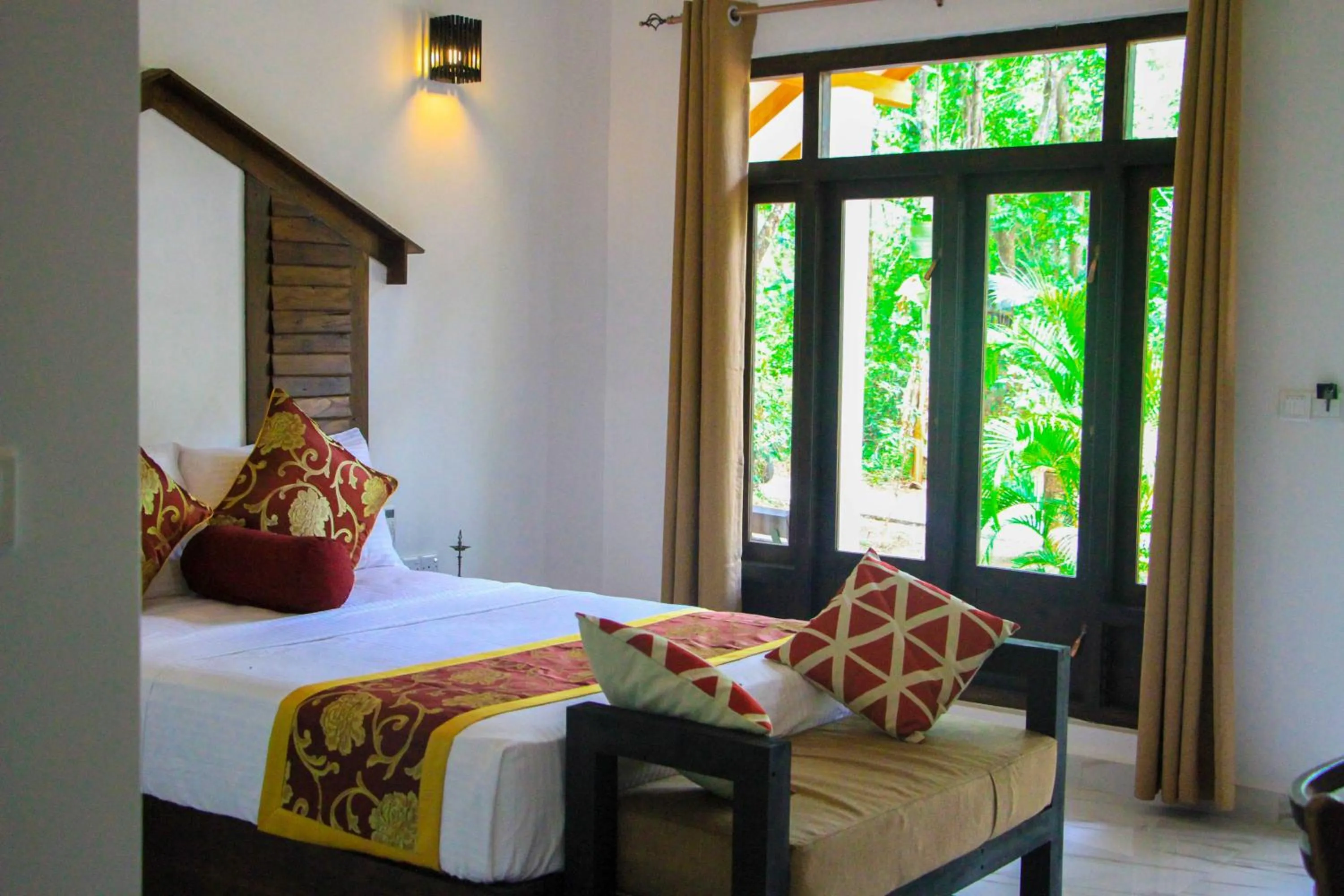 Bed in Palmyra Nature Resort Sigiriya