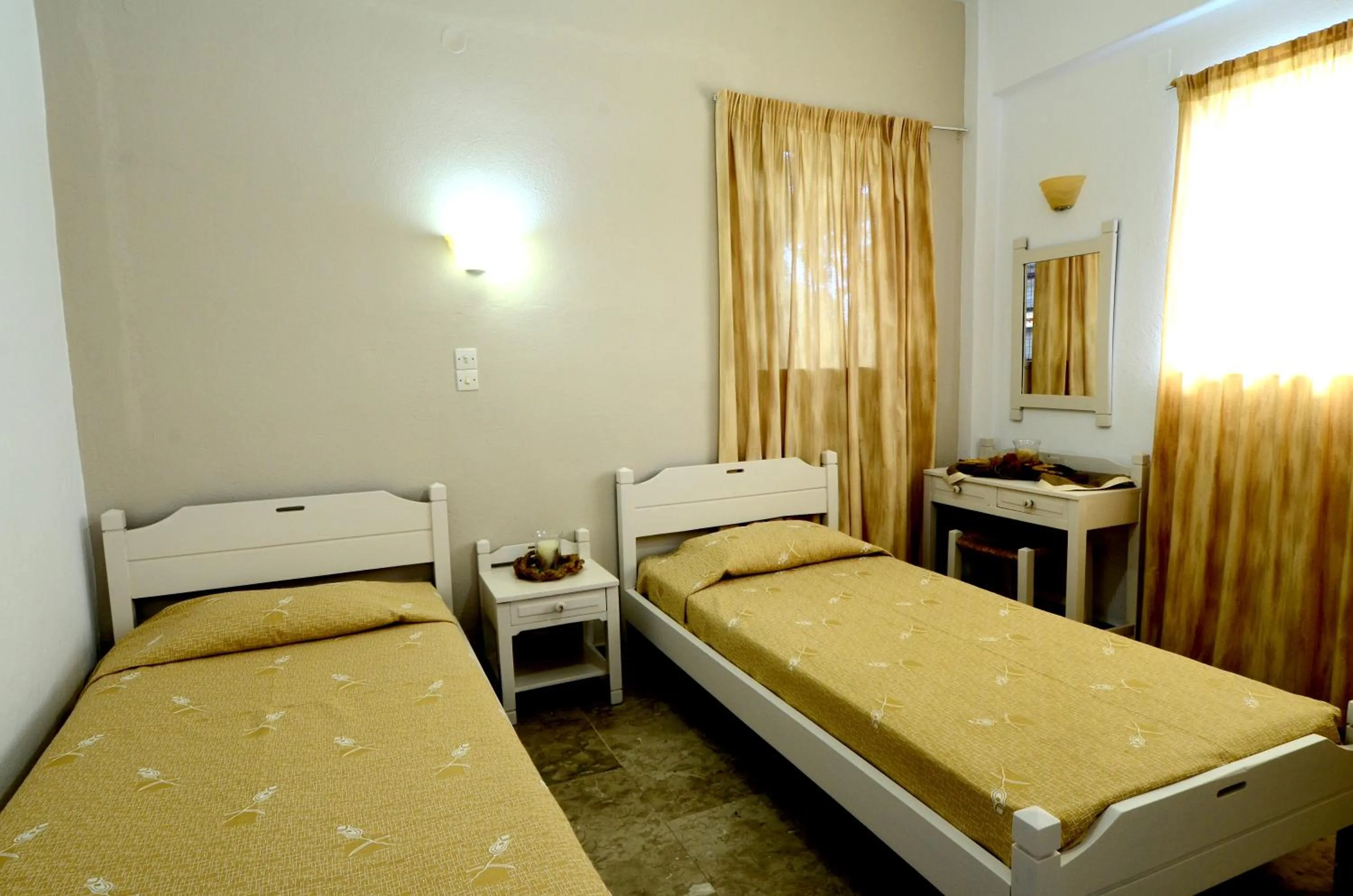 Bed in Golden Apartments