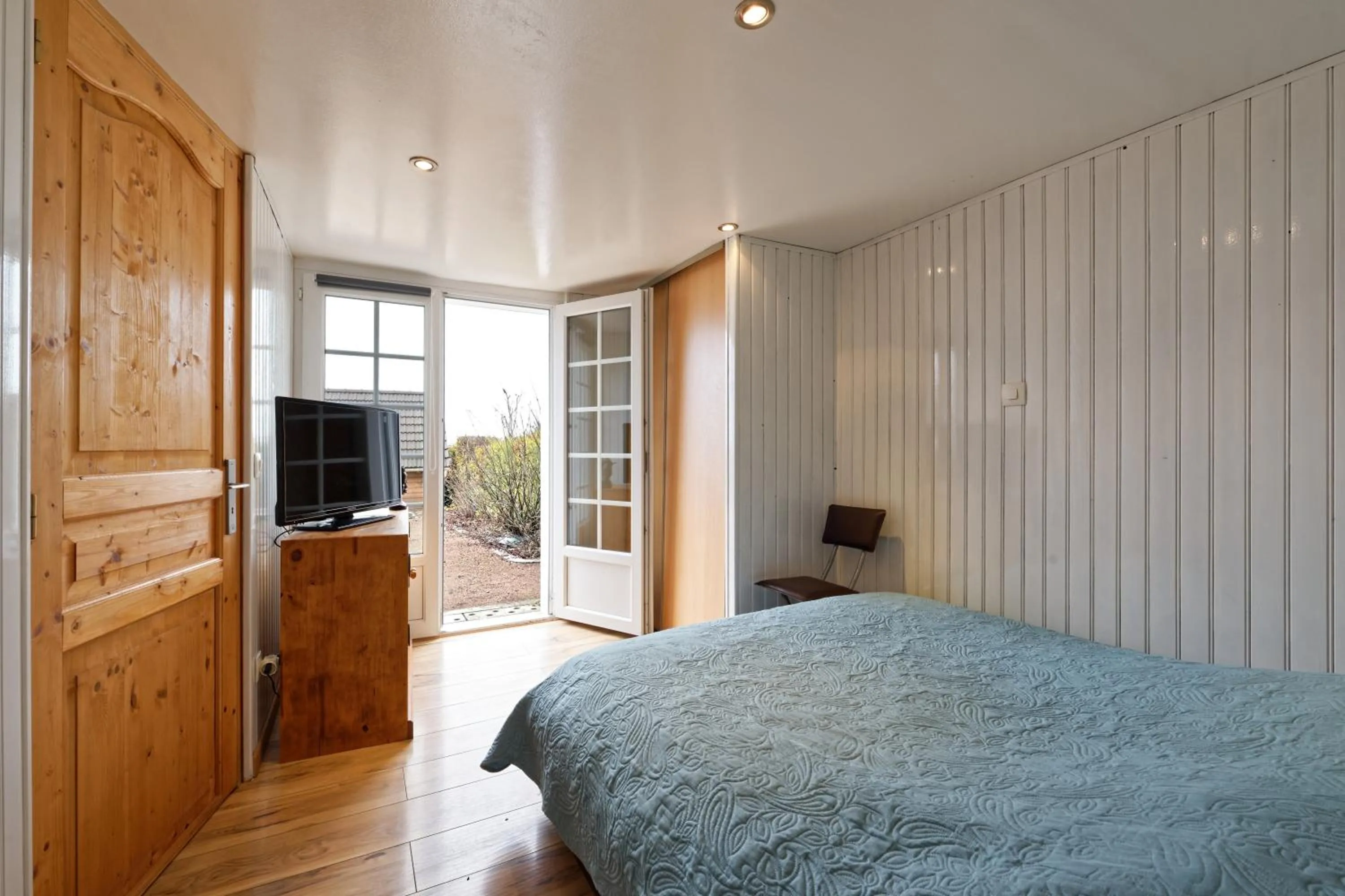 Bed in Chambres d'hotes à Autun