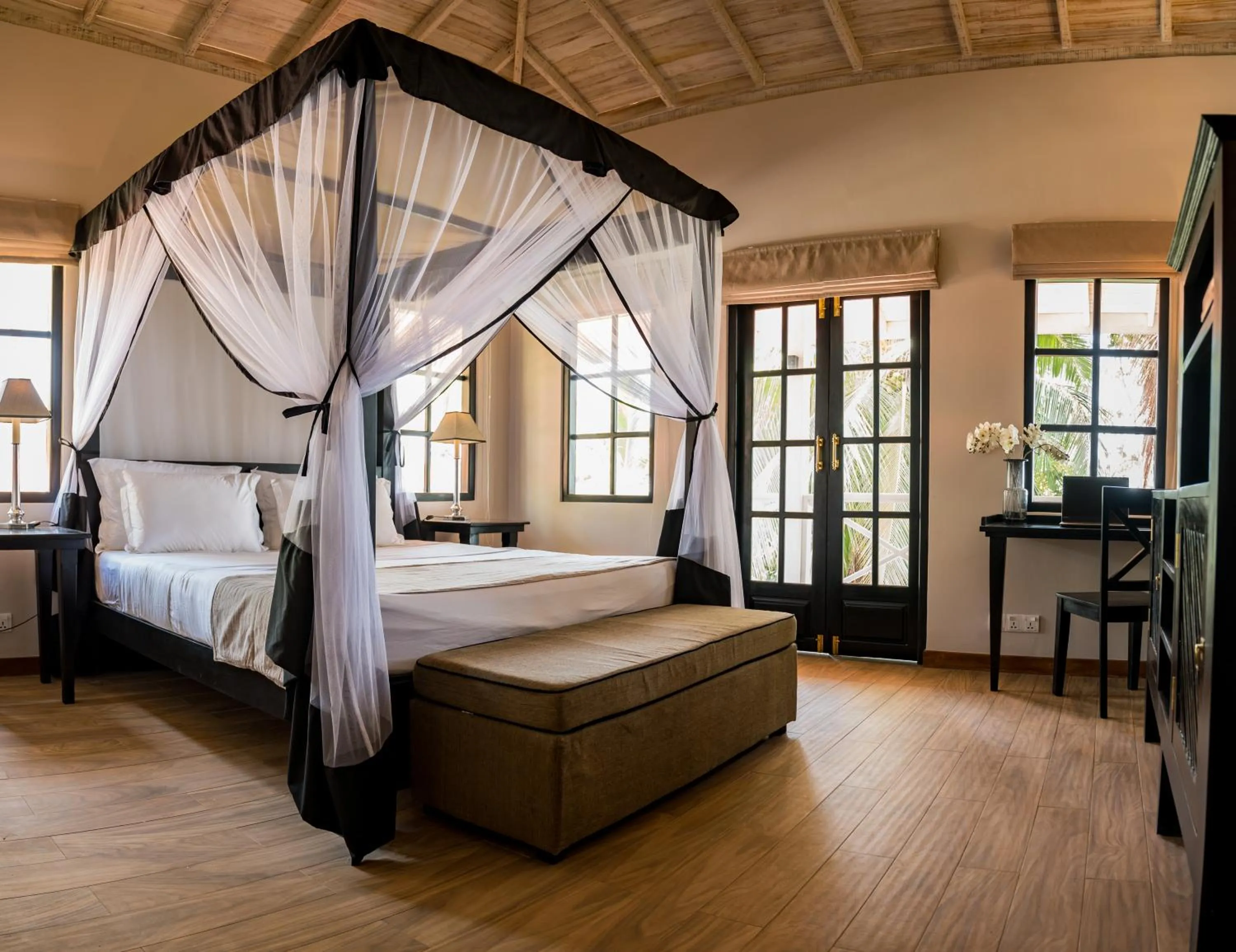 Bed in Tabula Rasa Resort & Spa