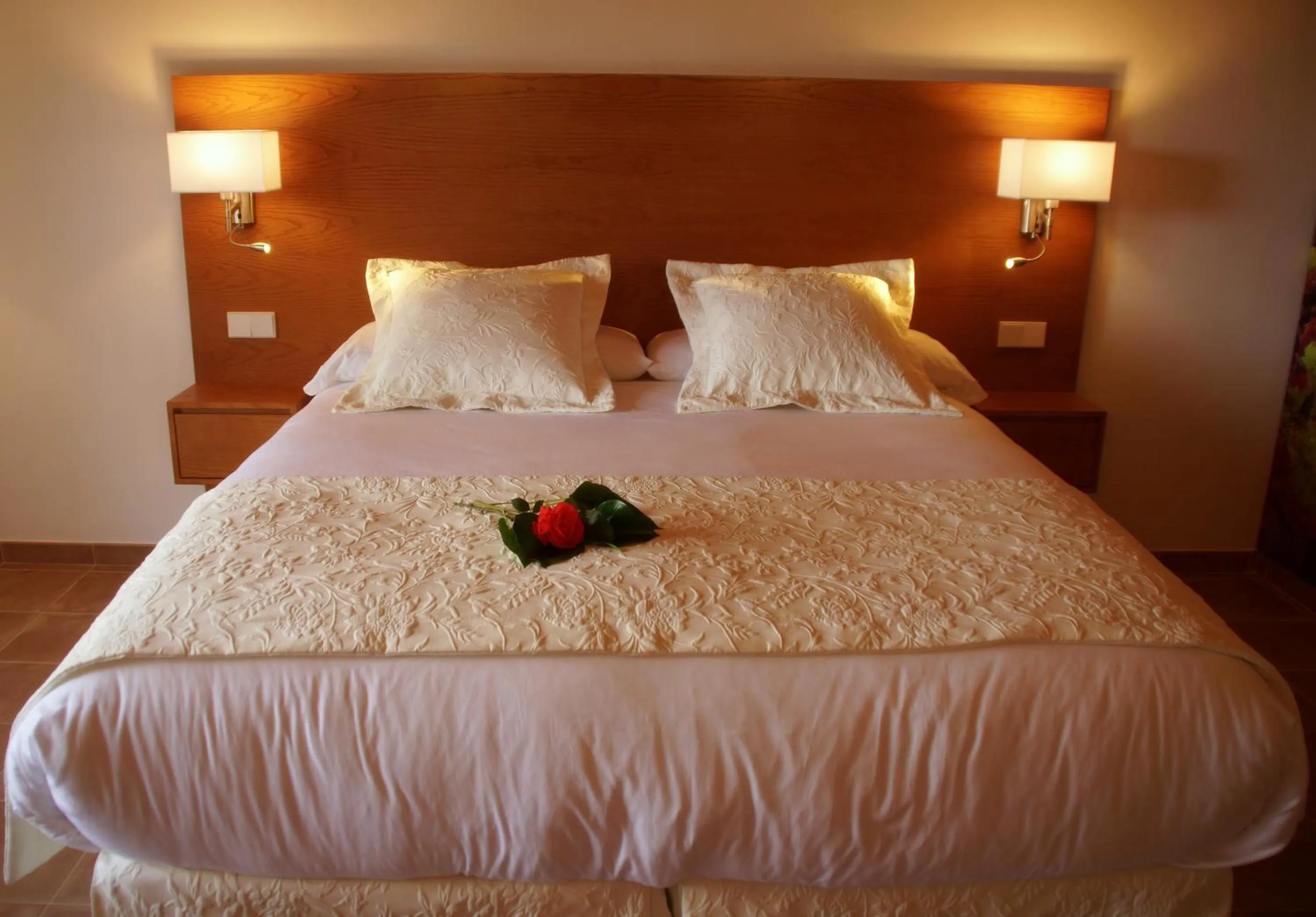 Bed in Aumallia Hotel & Spa