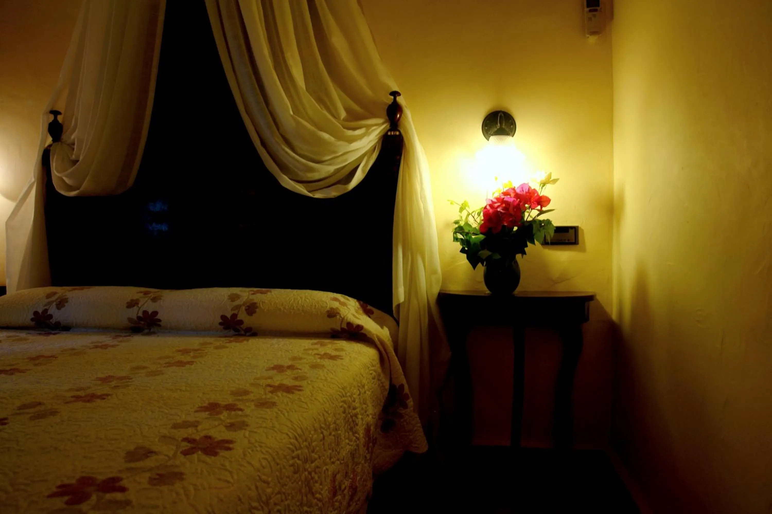 Bed in Aumallia Hotel & Spa