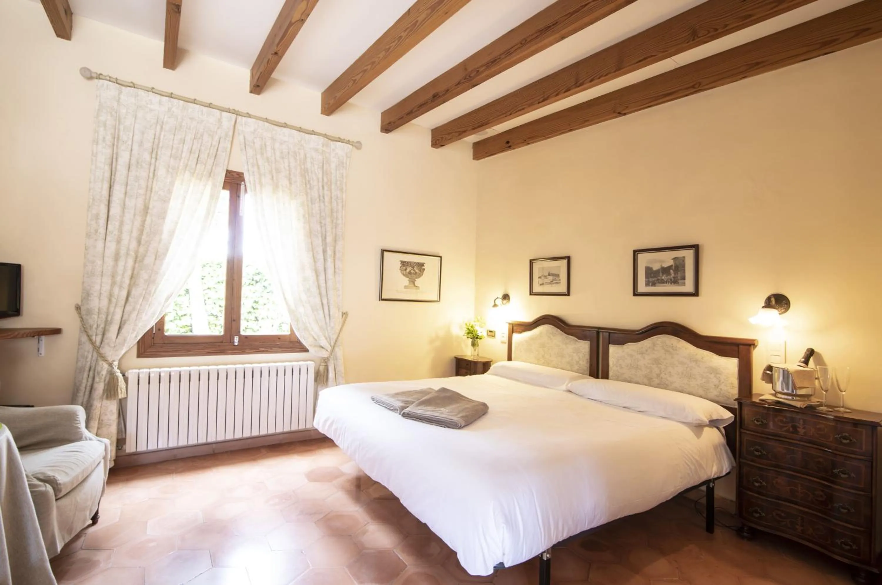 Bed in Aumallia Hotel & Spa