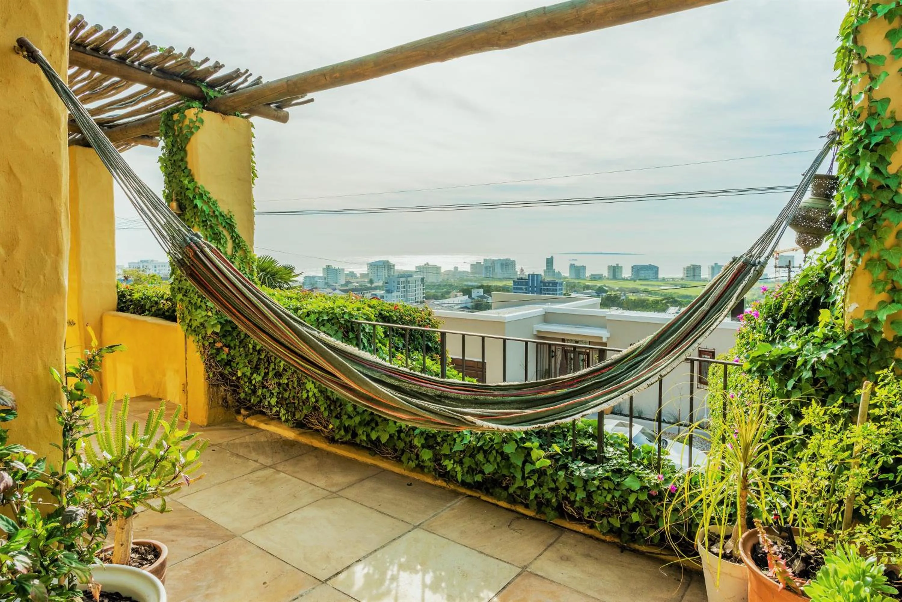 Sun, Sea & a Wood-Fired Hot Tub in a Downtown Mediterranean Villa