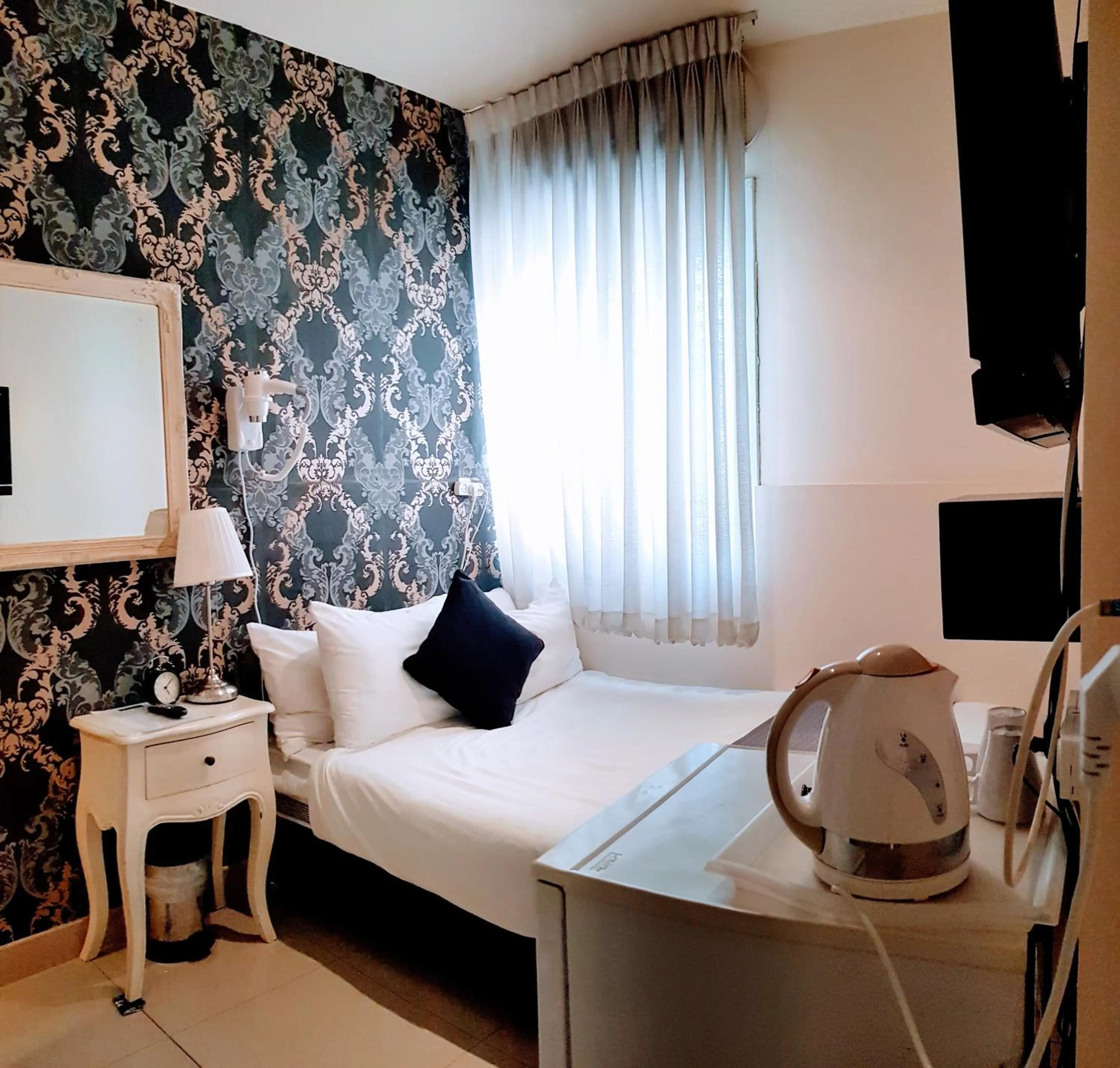 Bed in Central Hotel