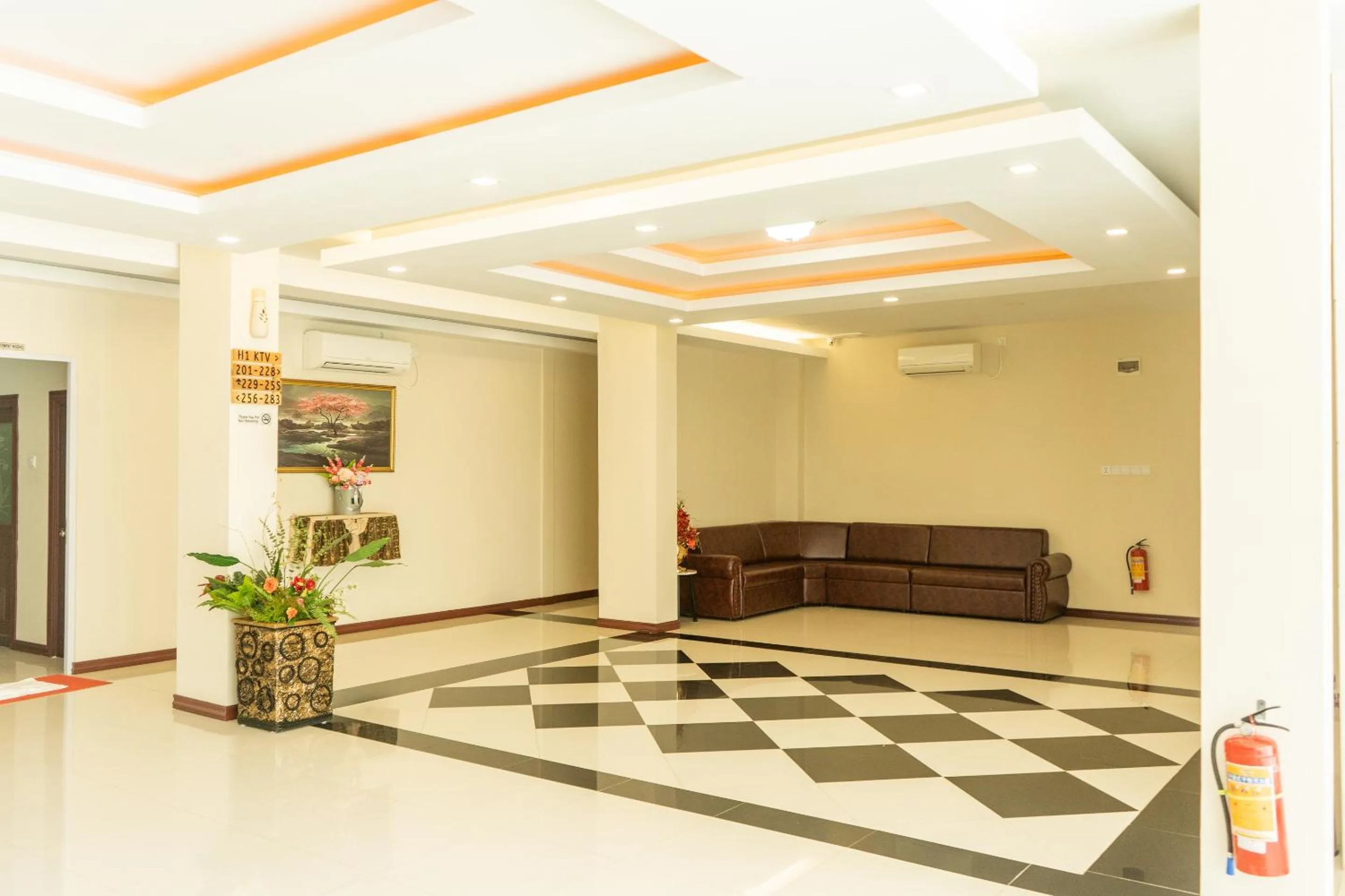 Communal lounge/ TV room in Hokkie Hotel Punggur Batam