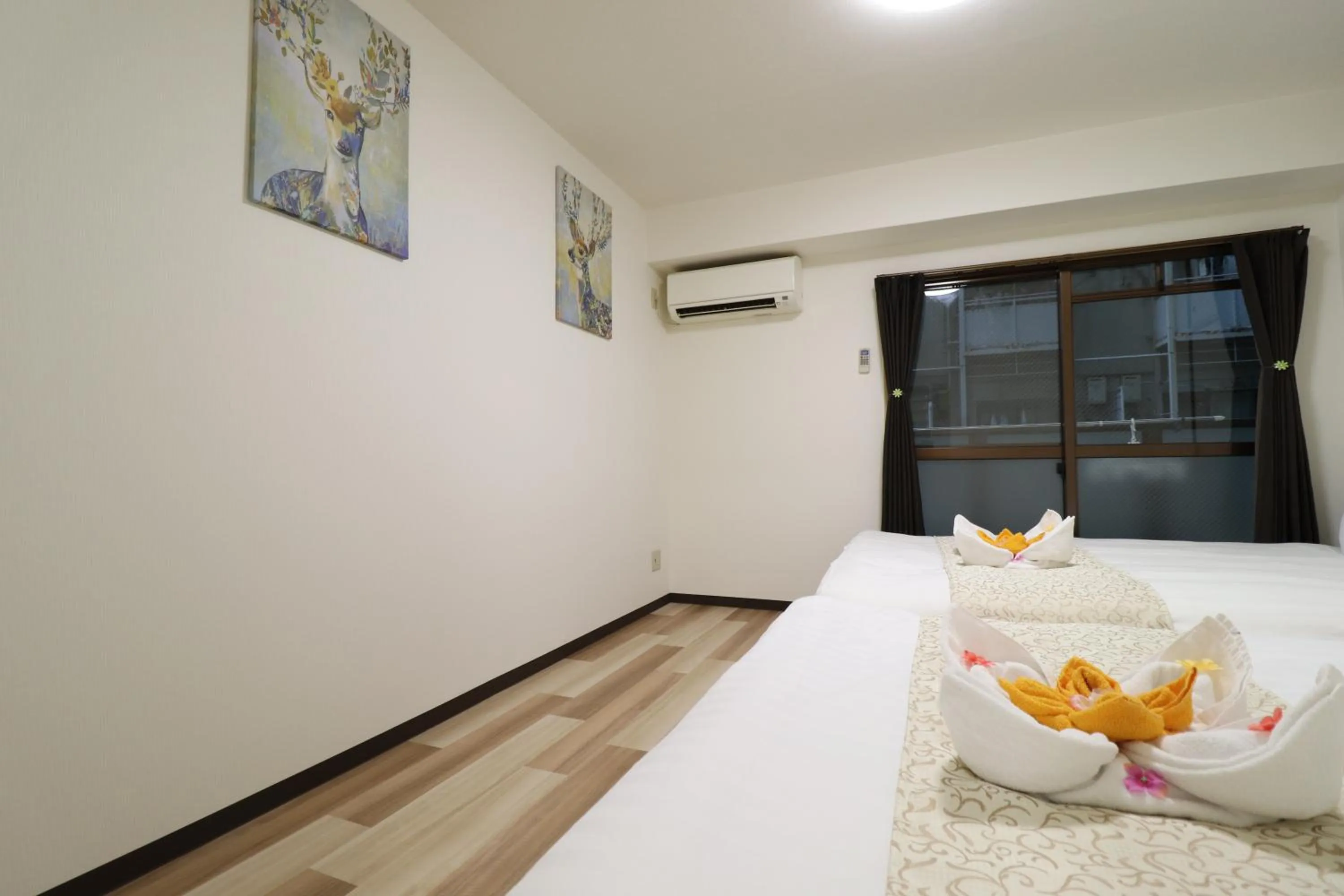 Photo of the whole room, Bed in Court Saiwaicho