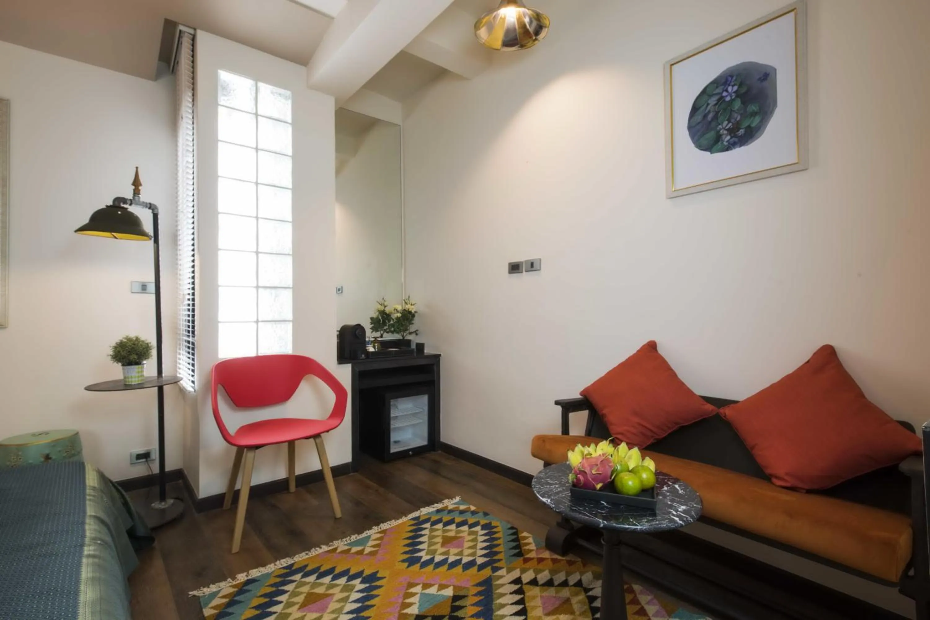 Seating area in Dhevi Bangkok Hotel