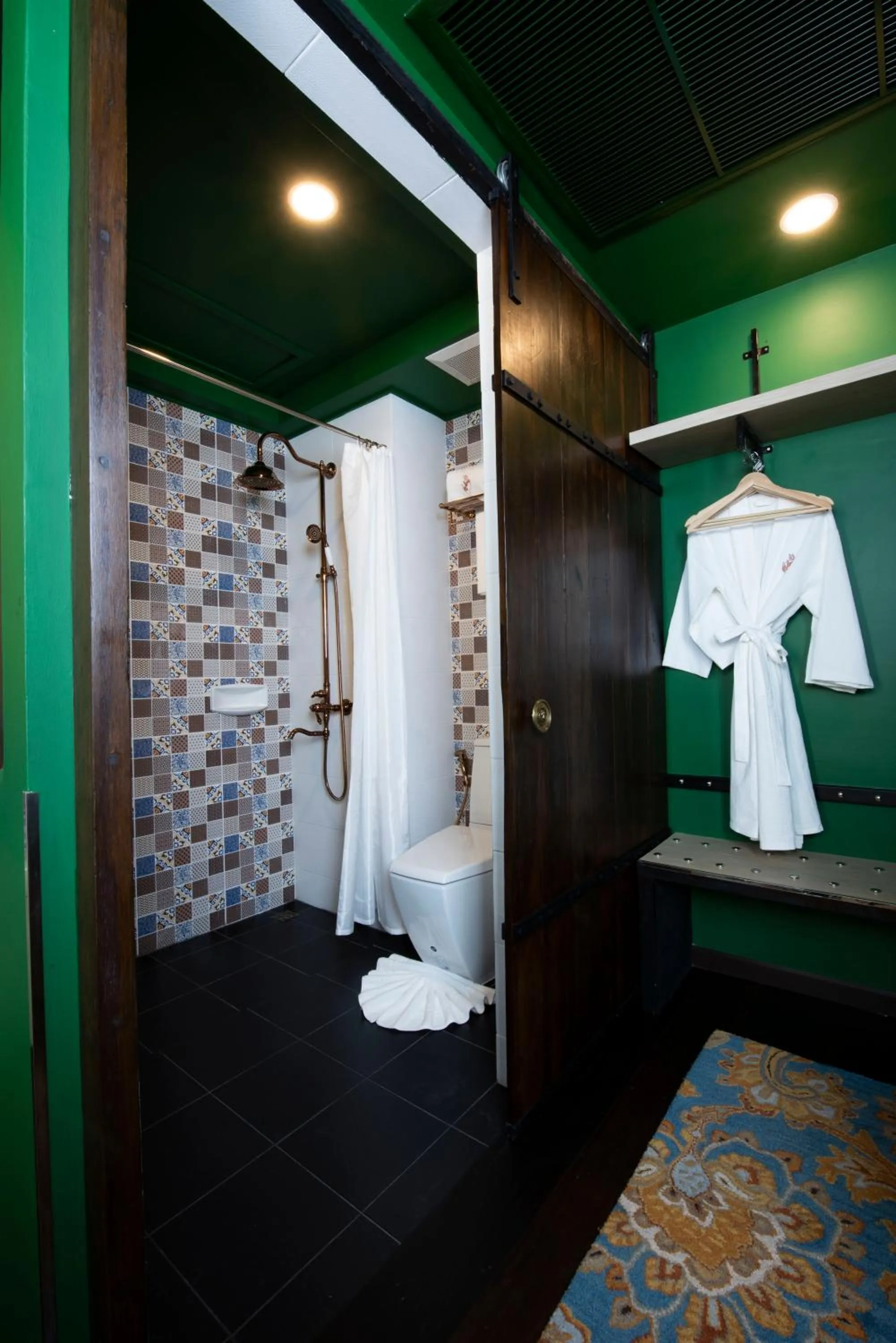 Bathroom in Dhevi Bangkok Hotel