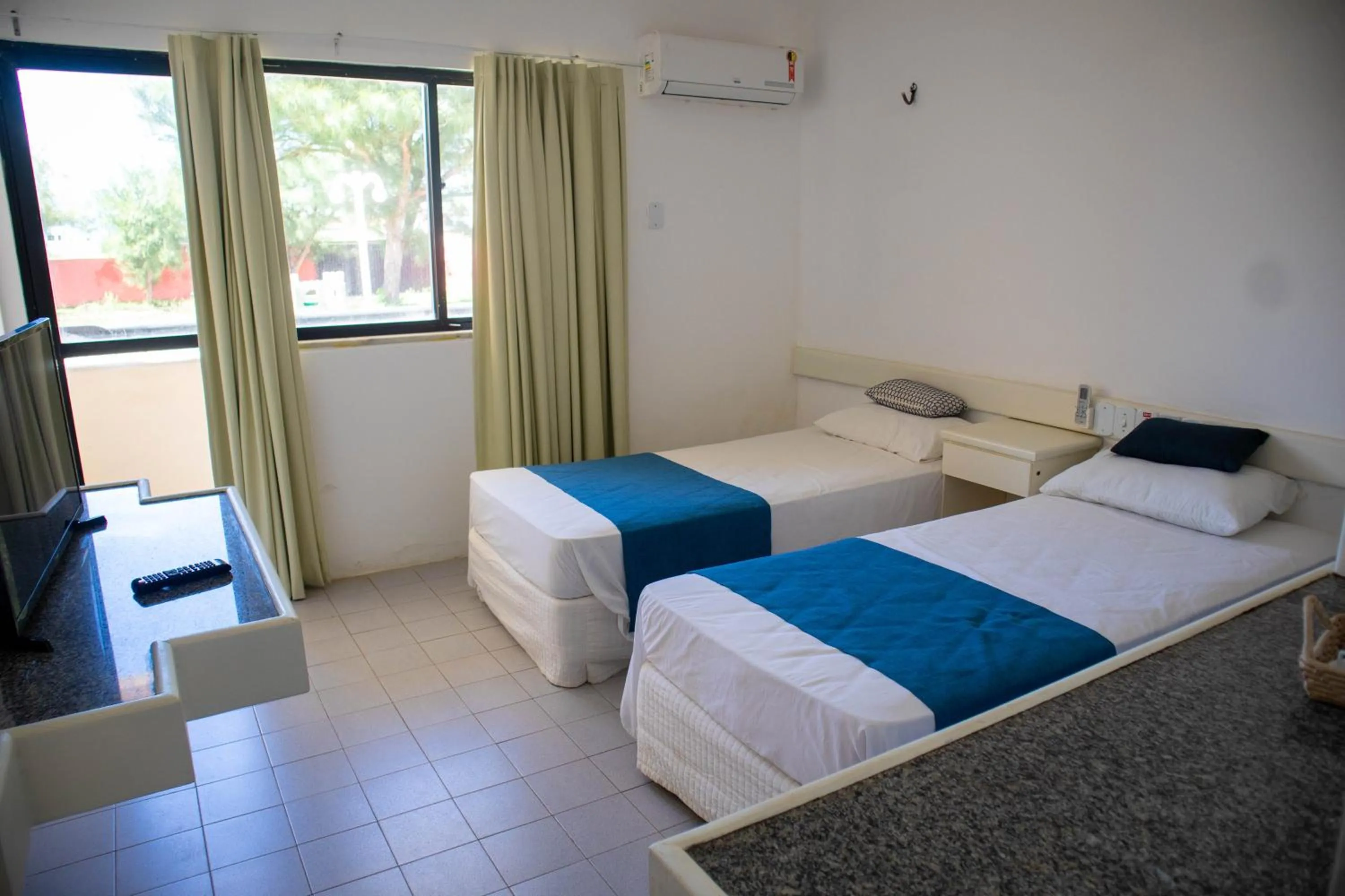 Bed in Hotel Amarração