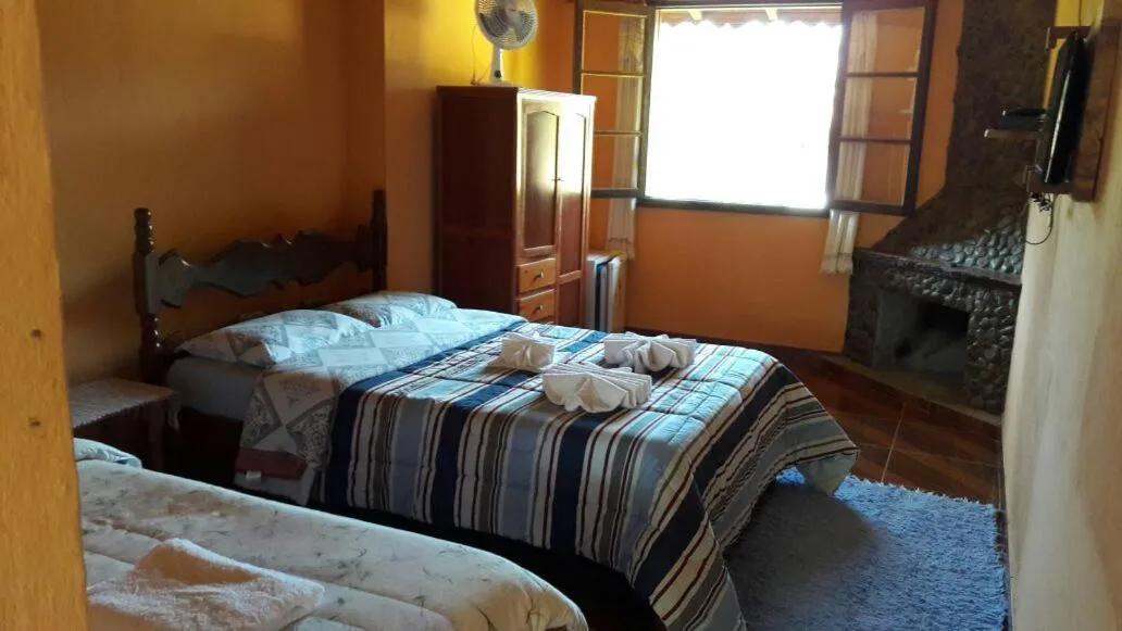 Bed in Pousada Vale da Represa