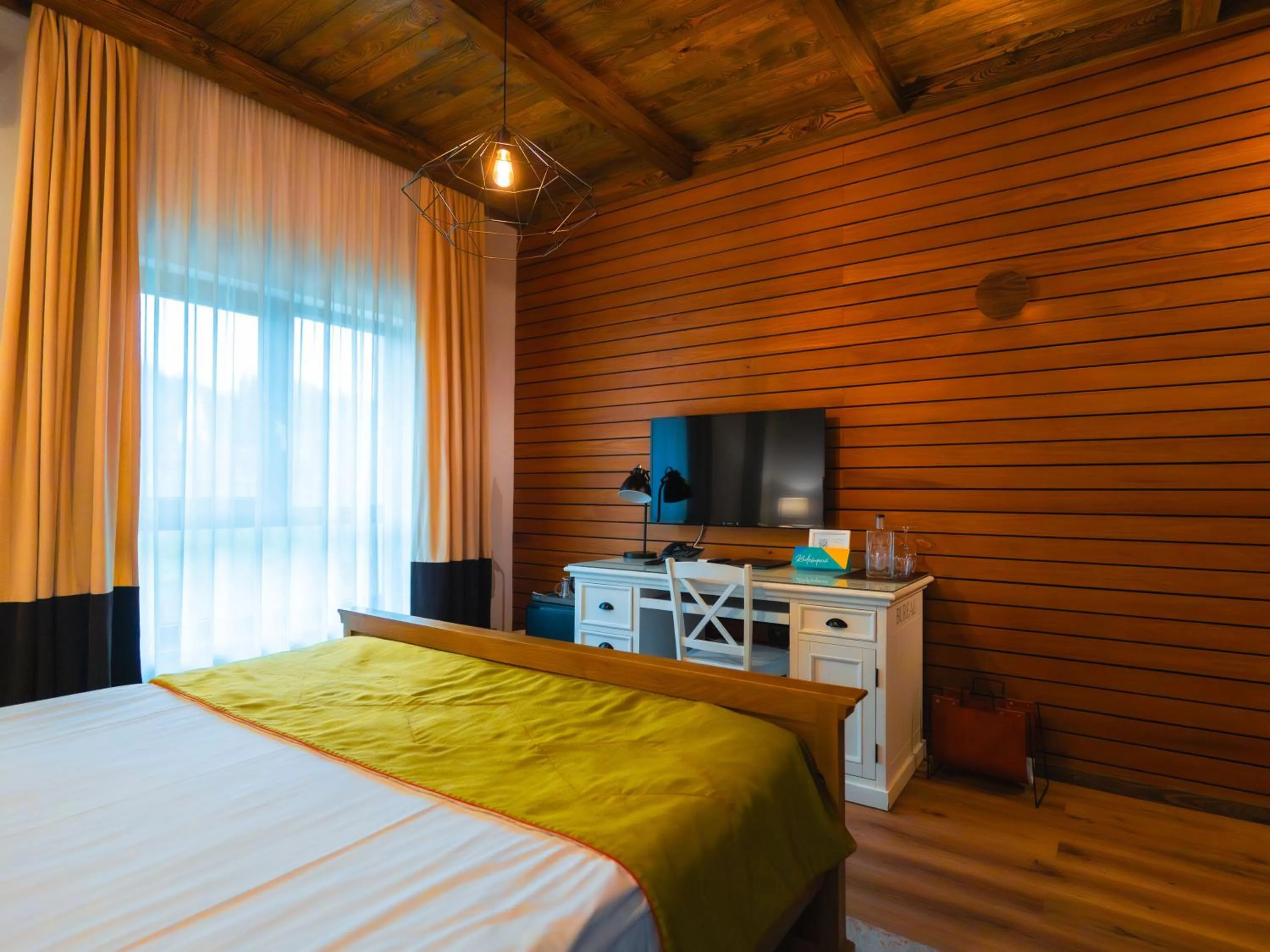 Photo of the whole room, Bed in KABAN BOUTIQUE HOTEL - 5Star Central Villa in Vatra Dornei