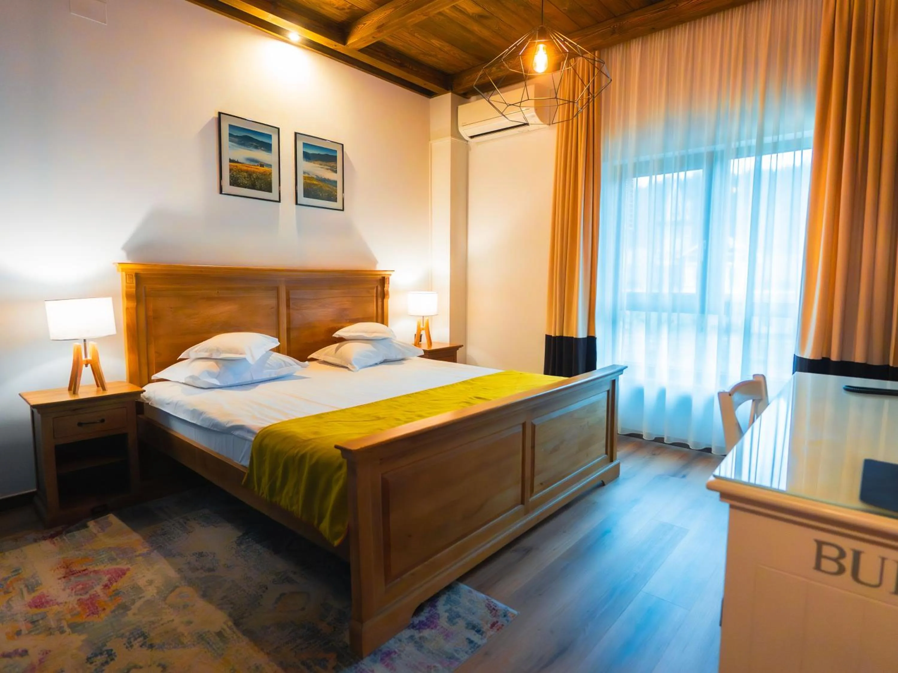Photo of the whole room, Bed in KABAN BOUTIQUE HOTEL - 5Star Central Villa in Vatra Dornei