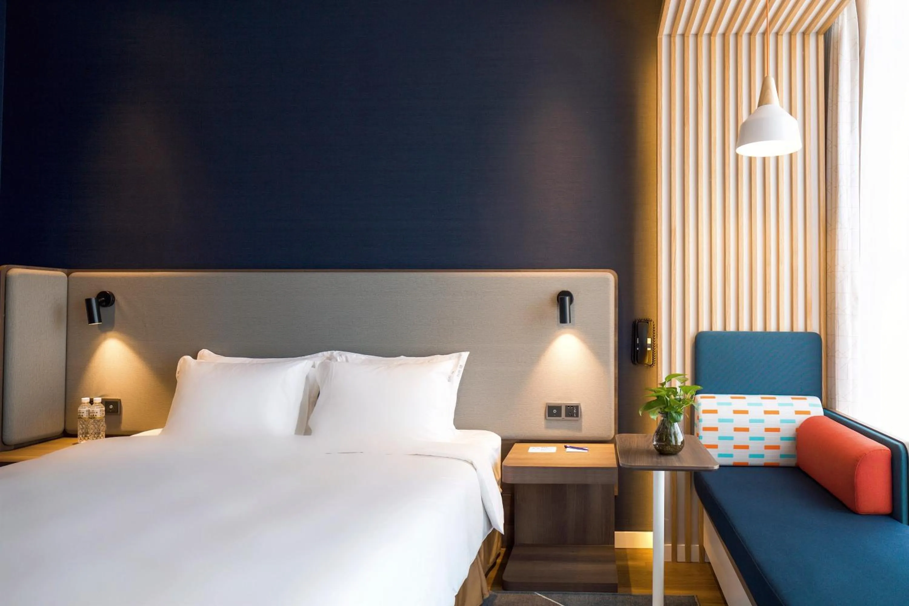 Photo of the whole room, Bed in Holiday Inn Express Harbin Qunli by IHG