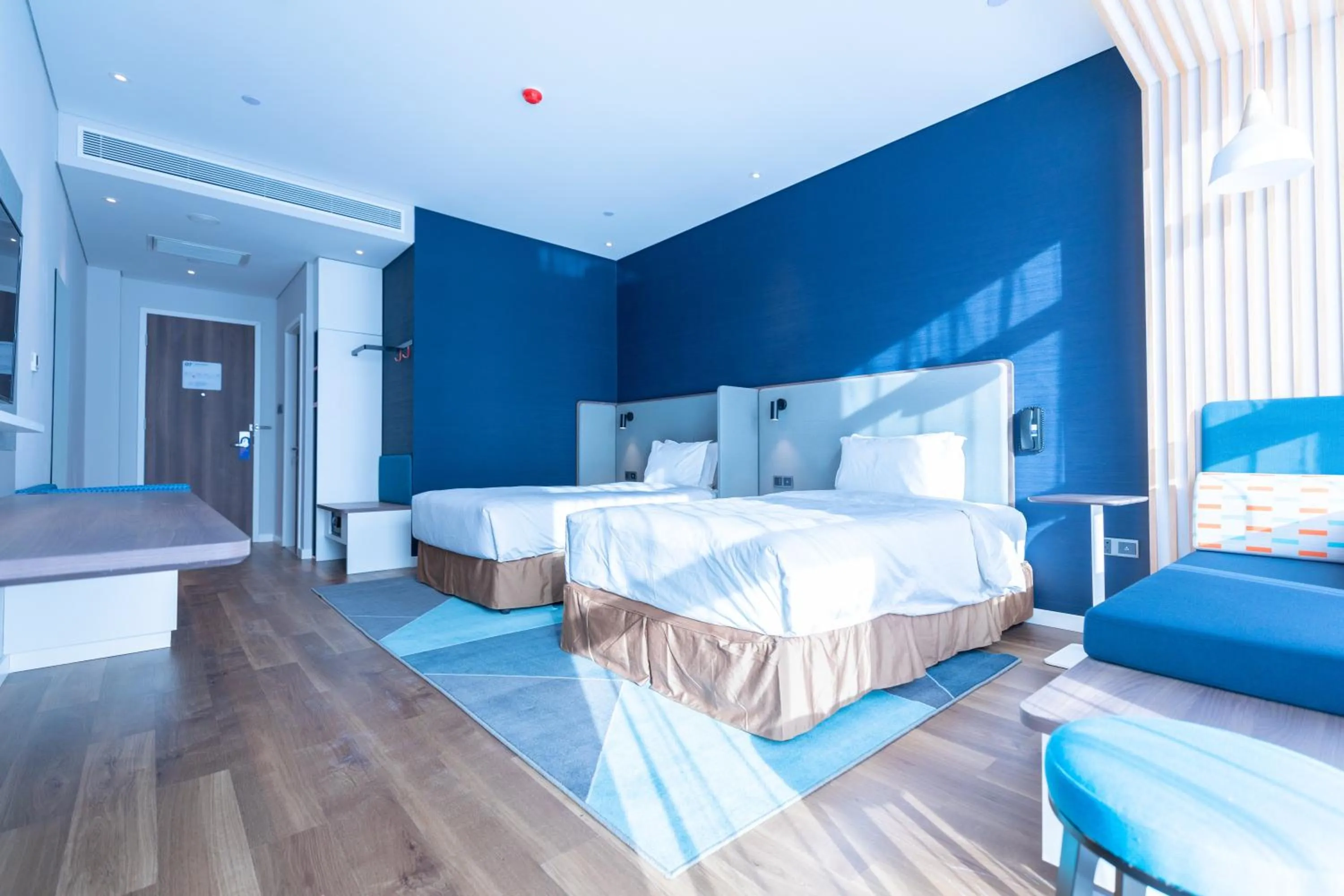 Photo of the whole room, Bed in Holiday Inn Express Harbin Qunli by IHG