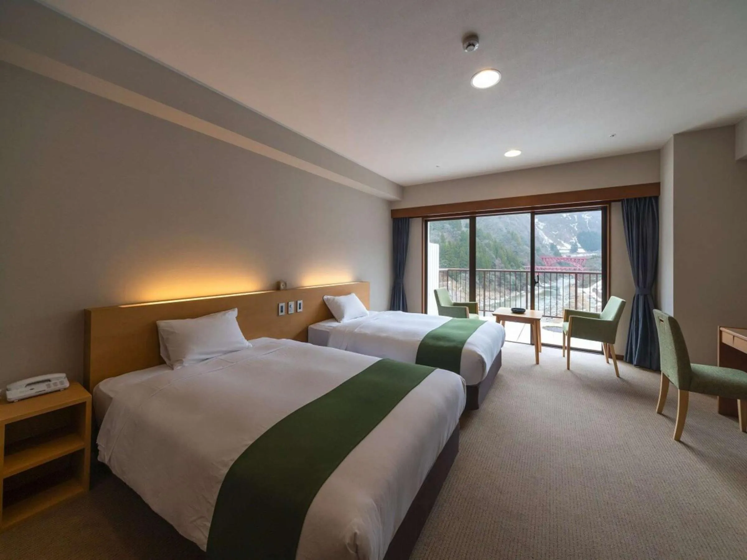 Photo of the whole room, Bed in Kurobe Unazukionsen Yamanoha