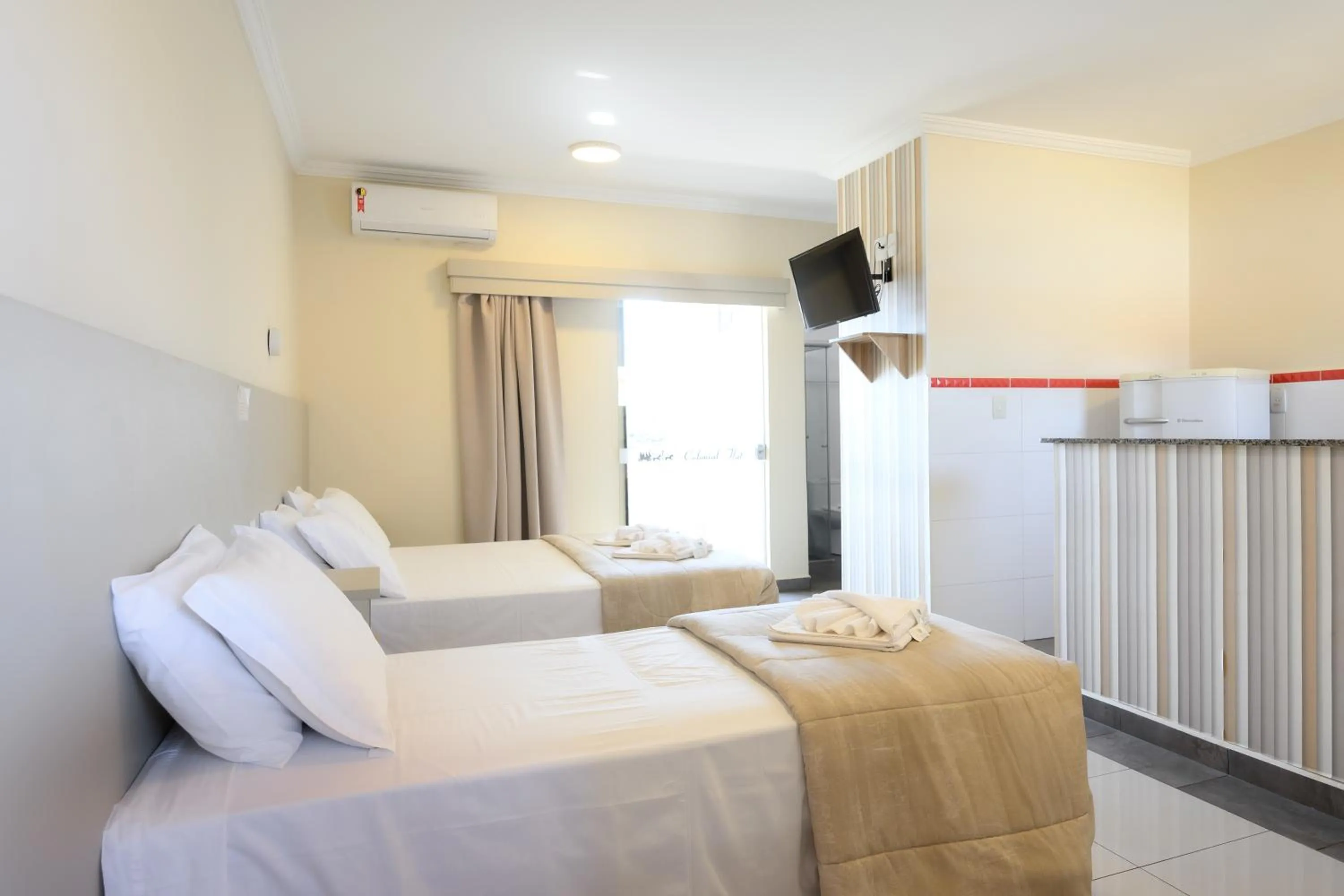 Bed in Colonial Flat Hotel